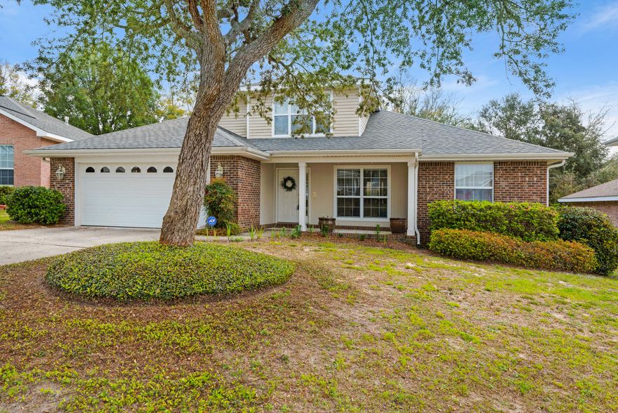 Southern Charm welcomes you onto the front porch to this 4 bedroom, 2 bath beauty. This home is a delight with quality finishes and careful attention to detail throughout. The Foyer greets with 10ft ceilings, 20x20 designer tile, crown molding and the ''flex room'' off the foyer can be a formal dining room, den or study. Gourmet kitchen features granite countertops, under mount-split sink, stainless steel appliances including fridge, Lexington oak cabinets, and counter bar. Spacious breakfast nook for casual eating and just out the sliding glass door is the screen porch for Al-Fresco dining. Inviting great room with cozy brick fireplace. Split floor plan with generously sized bedrooms and large closets. Three bedrooms and two baths on the main level