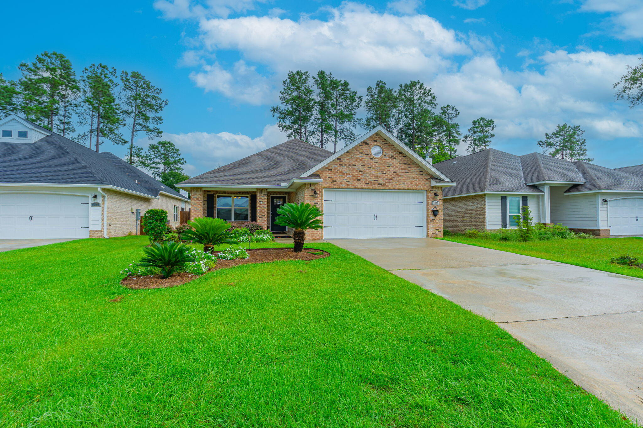 ASSUMABLE VA loan at 2.75% to qualified VA buyers and PAID OFF SOLAR! This immaculate, like new and beautifully maintained 3-bedroom, 2-bath, one story home is in the desirable gated Stonechase Subdivision just steps away from the community park. Built in 2021, by Celebrity Builders, this Gaslight floor plan blends modern amenities with thoughtful design and attractive finishes. A welcoming covered front porch leads into the entry foyer with a formal dining area opening up to the spacious, vaulted-ceiling Great room. The well-appointed kitchen features Quartz countertops, a breakfast bar and stainless steel, ENERGY STAR(r) appliances. A generously sized primary suite features a spa-style, ensuite bathroom with a double granite topped vanity, large shower, WC and a roomy walk-in closet. Two additional bedrooms down the hallway, share a full guest bathroom. French doors lead to the covered back patio and the pretty, professionally kept yard with sprinkler system, which will make your morning coffee and evening cocktails a pleasure! The Solar panels will give you BIG savings year-round, keeping your power costs under $150/month, whilst whole home Gutters, Fabric Hurricane shutters, a two-car garage with finished Epoxy flooring and a 1 year Home Warranty, complete the package. This home offers an excellent combination of modern design and energy-efficient comfort and a quiet, gated-community in the highly rated PACE School district. Don't miss the opportunity to make this lovely craftsman home your own.
