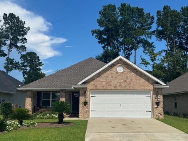 This immaculate, like new and beautifully maintained 3-bedroom, 2-bath, one story home is in the desirable gated Stonechase Subdivision just steps away from the community park, and offers an ASSUMABLE LOW RATE VA loan at 2.75% to qualified VA buyers. Built in 2021, by Celebrity Builders, this Gaslight floor plan blends modern amenities with thoughtful design and attractive finishes. A welcoming covered front porch leads into the entry foyer with a formal dining area opening up to the spacious, vaulted-ceiling Great room. The well-appointed kitchen features Quartz countertops, a breakfast bar and stainless steel, ENERGY STAR(r) appliances. A generously sized primary suite features a spa-style, ensuite bathroom with a double granite topped vanity, large shower, WC and a roomy walk-in closet. Two additional bedrooms down the hallway, share a full guest bathroom. French doors lead to the covered back patio and the pretty, professionally kept yard with sprinkler system, which will make your morning coffee and evening cocktails a pleasure! The Solar panels will give you BIG savings year-round, keeping your power costs under $150/month, whilst whole home Gutters, Fabric Hurricane shutters, a two-car garage with finished Epoxy flooring and a 1 year Home Warranty, complete the package. This home offers an excellent combination of modern design and energy-efficient comfort in a quiet, gated-community. Don't miss the opportunity to make this lovely craftsman home your own.