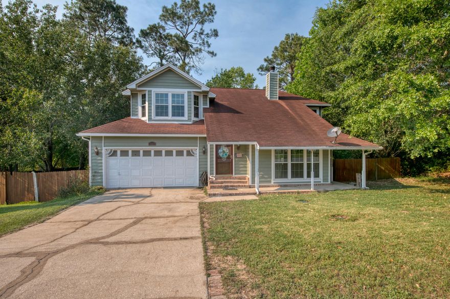 LOCATION, LOCATION, LOCATION! South of I-10 this charming 3 bedroom 2.5 bath will not last long! Upon entry you will walk into the living area with real hardwood floors with soaring ceilings. The electric fireplace is surrounded by a beautiful brick mantle. The kitchen features and stainless steel appliances, tile backsplash, and a pantry. Step outside onto your enormous deck, perfect for grilling and hosting summer bbq's where you can roast marshmallows in the backyard fire pit. A half bath and separate laundry room are just off of the 2 car garage. The large master bedroom with bay window and en suite featuring a dual vanity, walk-in shower with tile to the ceiling is upstairs along with the additional bedrooms and bath. Schedule your showing today!