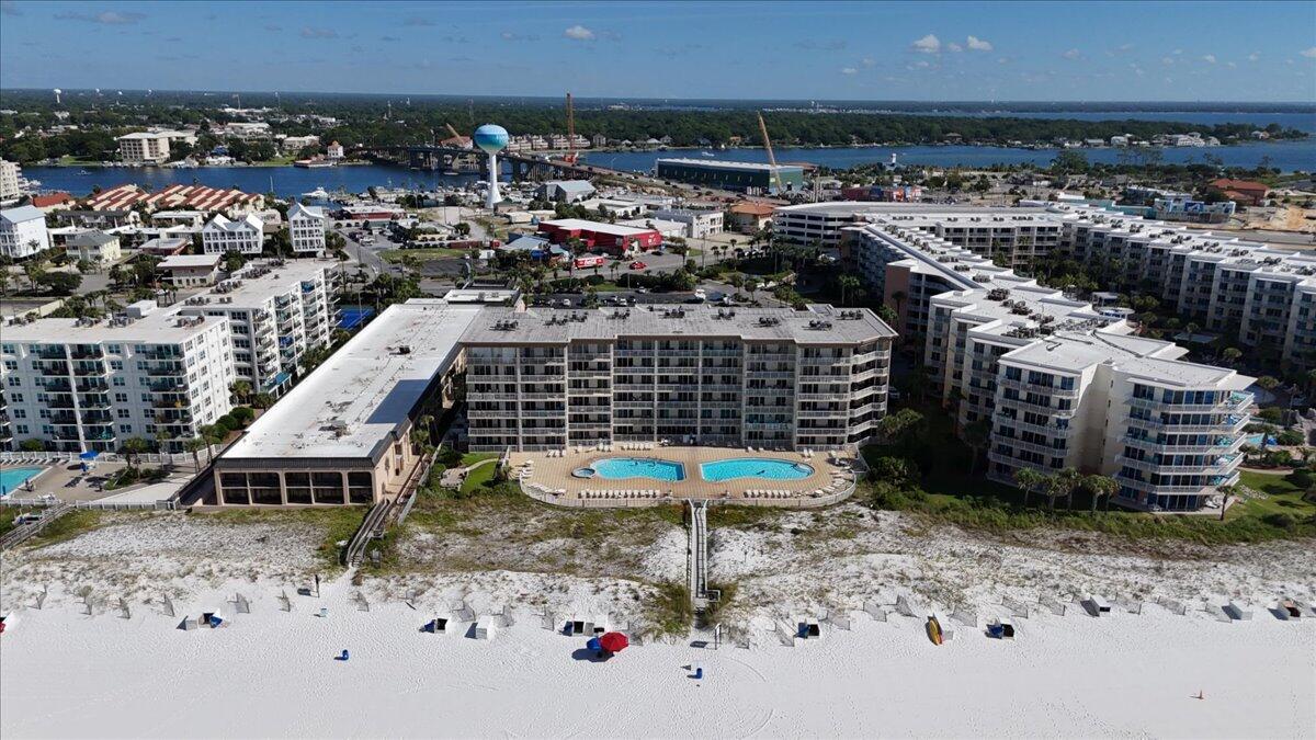 Welcome to your slice of paradise--a beautiful condo nestled along the most breathtaking beaches in America. This spacious retreat offers the perfect balance of luxury and tranquility. With a heated and cooled pool for year-round enjoyment, you can relax in comfort no matter the season. But the real highlight? Direct access to the pristine, white sandy beaches of the Emerald Coast, where crystal-clear waters meet miles of peaceful shoreline. Here, you'll wake up to serene ocean views and the soothing sound of waves. This condo is more than just a home--it's a flexible lifestyle. Whether you're looking for a primary residence, a peaceful second home, or an investment property with income potential, this gem offers it all. And when life gets a little too hectic, it's your personal oasis to recharge, soak up the sun, and boost your Vitamin D levels.
Step outside, and a quick walk across the street brings you to a delightful array of local seafood restaurants, lively karaoke bars, and vibrant entertainment. It's all about living your best life, with everything you need just steps away. Welcome home to the Emerald Coast, where relaxation, adventure, and endless beauty are always within reach!