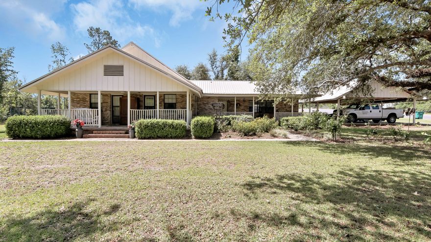 Check out this beautifully renovated 4 bedroom 3 bath 2,437 SqFt Brick home on 7 acres with a fish pond! New tin roof, new paint, and new flooring! This home with its sprawling 7 acres is only 6 minutes to the center of Marianna, seclusion and convenience at its finest. This home has a spacious family room, open kitchen, 4 bedrooms, 3 baths, and a great sized Florida / Bonus room that is heated and cooled. Beautiful front porch to enjoy your coffee in the mornings. Property is listed in ECAR MLS with MLS number 847159.