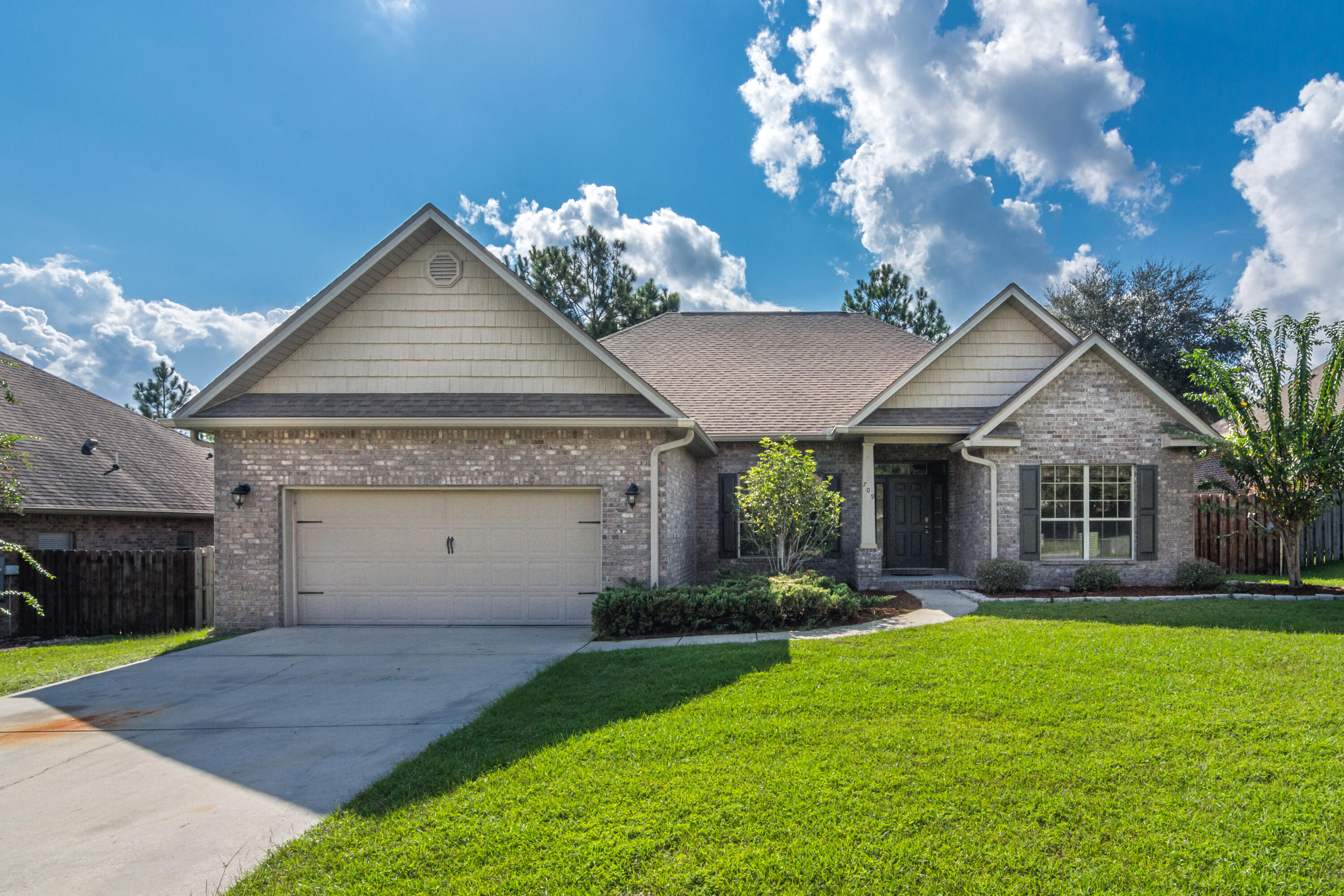 Beautiful home in a great subdivision in South Crestview. All new flooring and paint throughout.There are 4 bedrooms, 2.5 baths in 2240 sqft of fantastic living space.