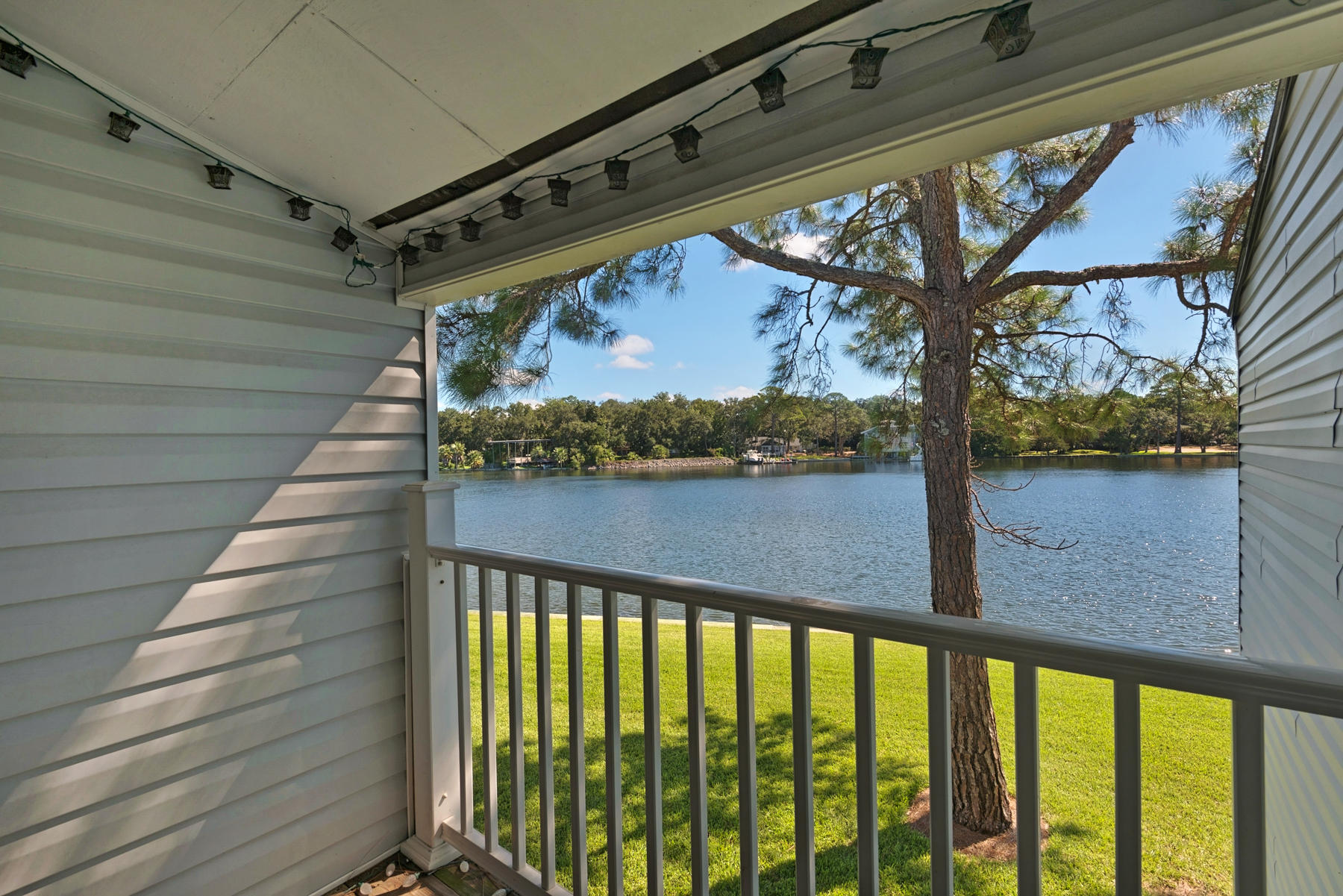Largest Waterfront 2 bedroom floor plan now available in sought after Finisterra Condominiums. Gorgeous views of Lake Clyde from your balcony and dining area window. Top floor location close to the community pool provides convenient access to the amenities. Onsite laundry facilities and tennis courts. Great location to the military bases and beaches. Perfect for your first home or rental investment.