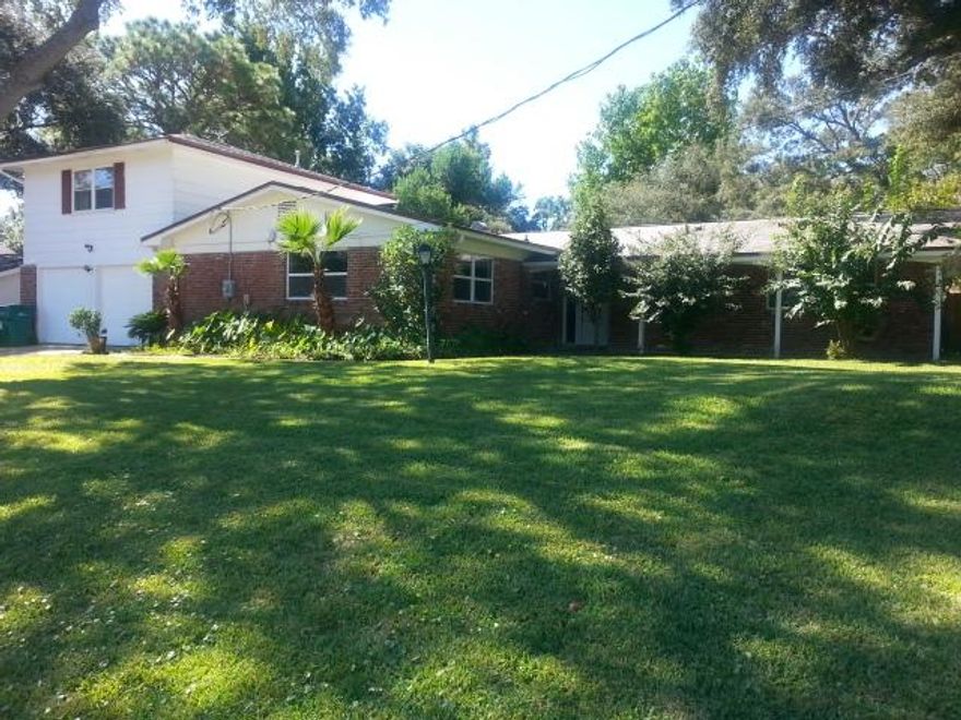 Price reduction! Convenient location - accessible from Racetrack/Beal Pkwy? or Eglin Parkway. Large Corner lot - high elevation. recent updates 12/14 fenced in back yard with in ground swimming pool. upgraded kitchen with stainless steel appliances. Tile and wood flooring. large family room and living room - Master bed room and main living area is on 1 level. Mother in law suite is on the second floor - with private balcony overlooking the pool. Seller may pay up to $5k in closing costs.