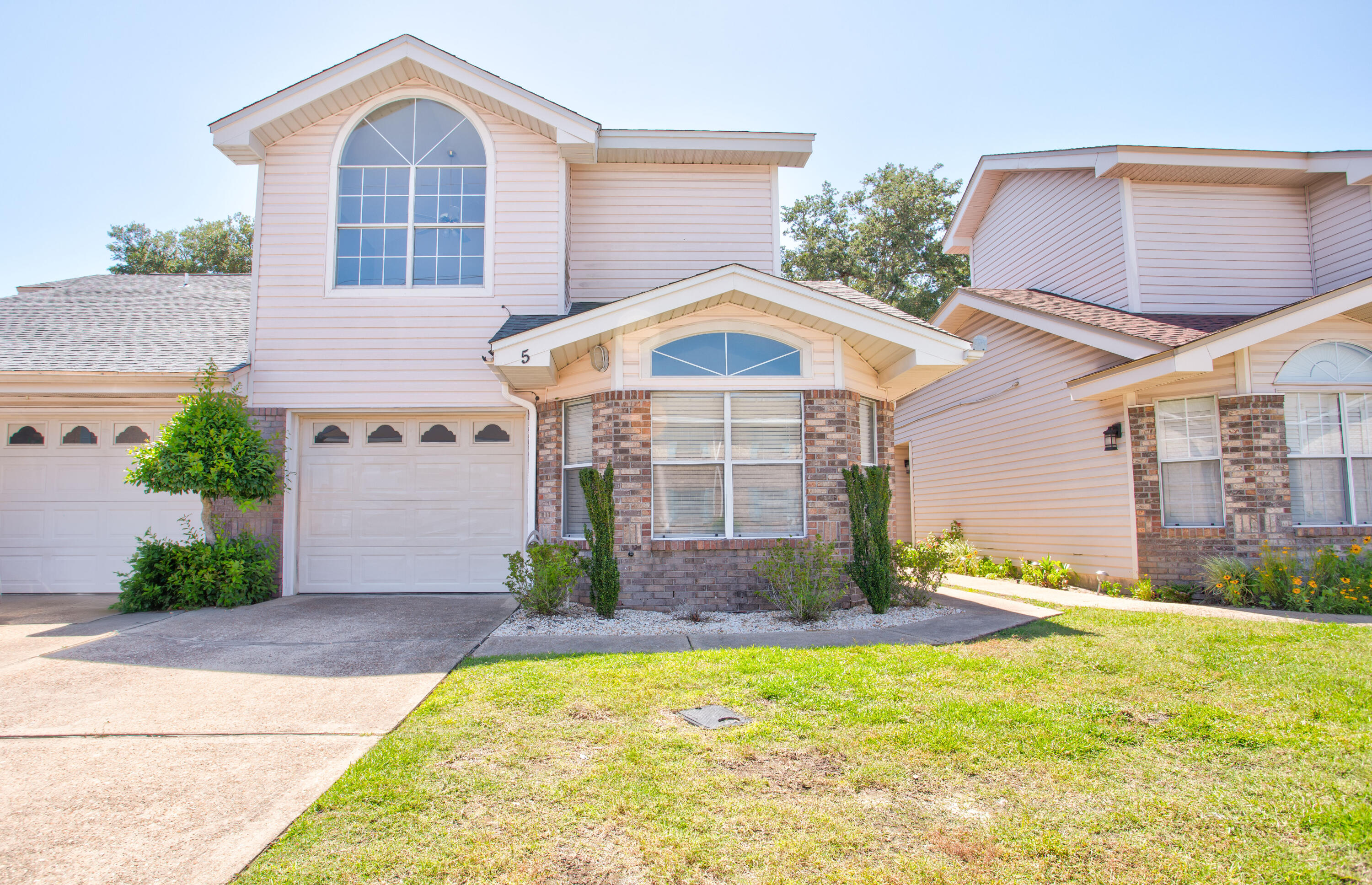Welcome home! This beautifully maintained townhome is waiting for its new owners. Situated in a convenient location to all military bases and the white sandy beaches of the Emerald Coast. This home features 3 nicely sized bedrooms, 2 bathrooms with lots of bright light in all rooms. The master bedroom is located on the first floor and features tall ceilings and a generous sized closet. The kitchen features stainless steel appliances, granite countertops and an open concept the flows into the living room and dining area. The additional 2 bedrooms are located on the second floor and have a shared bathroom. Enjoy evenings on the back patio or a dip in the community pool. This home was just updated with LVP flooring and new paint throughout.