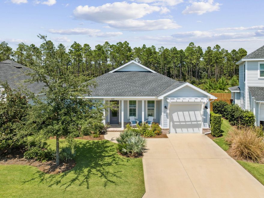 Charming Single-Level Beach Home in Watersound Origins&#8232;This beautifully maintained Adams Plan by Huff Homes offers 3 bedrooms, 2 bathrooms, and desirable one-story living with an open-concept layout and 9' ceilings. The spacious living room flows seamlessly into a separate dining area and a thoughtfully designed kitchen featuring quartz countertops, Bosch stainless steel dishwasher, new refrigerator with convertible drawer, gas range, and a new Whirlpool microwave. Organization is a breeze with REVA-A-SHELF cabinet drawers, hidden trash storage, and a pantry outfitted with ELFA adjustable shelving--even on the doors.The primary suite is privately positioned in the back corner with a large walk-in closet enhanced by an ELFA wire shelving system. 2 additional bedrooms with ample closet space complete the interior. A laundry room with upper cabinets, linen closet, and hall closet add to the home's generous storage options.
Outdoor living is equally inviting with a screened porch accented by heirloom brick, overlooking a large grass yard with ROOM FOR A POOL, plus a concrete patio with gas hookup for grilling and a privacy fenceperfect for entertaining. Additional features include plantation shutters, irrigation system, and an epoxied garage floor. The new Watersound Parkway extension provides quick and easy neighborhood access.