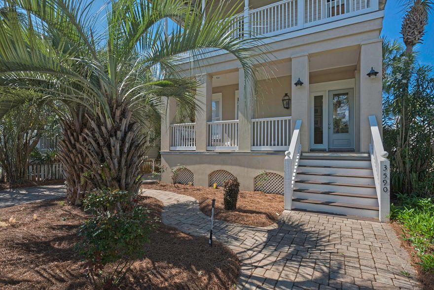 Stylish Beach Home in Luxury Resort with Large Private Pool
Loaded with charm, style and class, this 4 BR, 3 BA 2-story beach house has been designed for the casually sophisticated lifestyle. The gated, luxury resort community boasts 3,000 feet of pearl white beaches, lush tropical landscaping, two pools and lighted tennis courts. But, this property has its own large pool and sits waterfront on an enchanting little lake. The setting is as beautiful as the home, which includes copious white wainscoting below pale straw walls, crisp white trim throughout, pocket doors, panel doors and French doors, a delightful gas fireplace, window seats and very nice window treatments. Fully furnished and turnkey for living, renting or both, the home's outdoor wood covered decks are perfect for entertaining and relaxing.

The kitchen's slate countertops are the ideal complement to stainless steel appliances and white cabinets, including one open, two glass front. The breakfast bar flows into the open dining and living spaces capped with unusual wainscot white cathedral ceilings. The fireplace is surrounded by marble with a marble hearth, and the whole aura is one of bright tranquility in a refined beach haven. You can put your toes in the sand in under 3 minutes walking and enjoy close by shopping dining, water sports and entertainment.