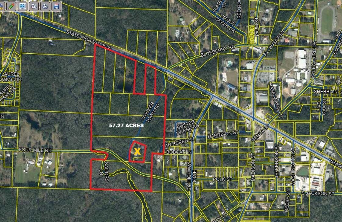 This exceptional 57.27-acre development parcel is situated in the heart of the rapidly growing Freeport market area. Strategically located just east of Hammock Bay with 1000 feet on Hwy 20, the property is only minutes from the thriving business district along Hwy 331, as well as Freeport Elementary, Middle, and High Schools. It's a quick 20-minute drive to the stunning beaches of 30A, along with world-class shopping and dining options. The property is zoned Commercial Residential and within the City of Freeport Zoning District, with development potential ranging from 2 to 14 dwelling units per acre. Commercial frontage along Hwy 20. The land is mostly uplands, with Four Mile Creek running through the southern portion and direct access to the bay. Buyer to verify data for its own use