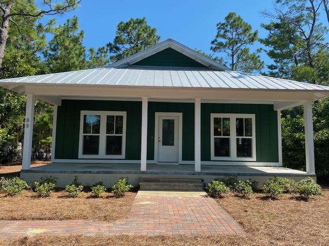 Florida Custom Cottage, Single story with a large covered front porch & screened back porch. Energy efficient with mini split HVAC system, 6 inch walls -spray foam insulation with Rinnai- on demand hot water system. Special features inculde 9 foot ceilings, impact glass windows, metal roof and stained concrete floors. The open kitchen offers Maytag stainless steel appliances, custom cypress cabinets & granite counters. Step off the screened porch and into the tranquil back yard offering space for the entire family with low maintenance landscaping. NO HOA to tell you what to do in your yard or at your home. Historic Point Washington, 1 block off the bay & minutes to the beautiful beaches of South Walton.