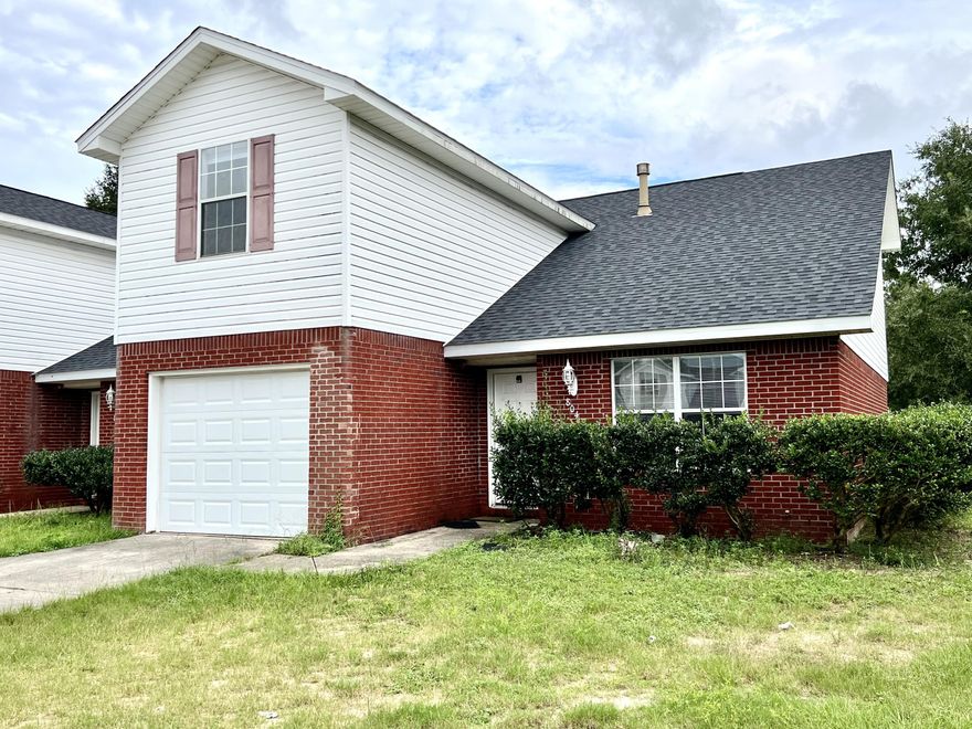 Great 3 bedroom/2.5 bathroom all-brick townhome. Unit freshly painted in neutral tones.  Living room features vaulted ceilings & an architectural arch above the fireplace. Kitchen including stove, dishwasher & loads of cabinet & counter space. Tenants must supply their own refrigerator. Upstairs master suite is very spacious & guest bedrooms are generously sized. Main living area is tiled & bedrooms have new carpet. Great central location, convenient to both Highway 85 & Highway 90. Walker Elementary is right around the corner & the post office, library & Marquis 10 Theater are just a short drive away. Owner will consider a SMALL dog or cat with restrictions. Any pet must be spayed/neutered, housebroken and current on all shots. A non refundable pet fee will be required.  NO SMOKING.  Any person 18 years old or older must complete separate applications. Tenants required to carry renter liability insurance
