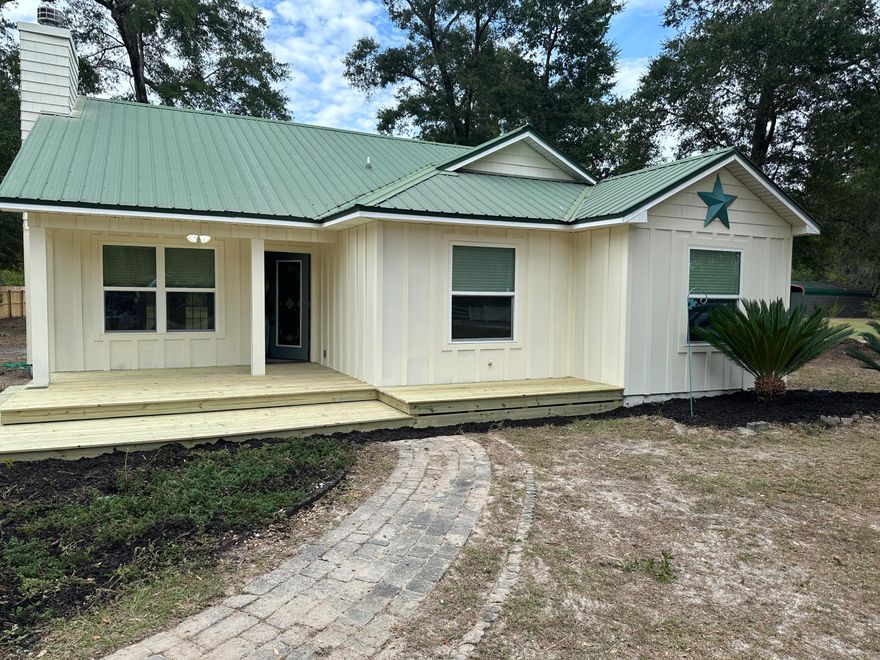 3 bed 2 bath Florida cottage situated on approximately one half acre with a great location in the rapidly growing Freeport area. Located off Hwy 331, this home is close to shopping in Freeport and only about 15 minutes from the beach, and literally a 1 minute drive to the Publix, shopping and more. The home features include a wood-burning fireplace and vaulted ceiling in the living area, ceramic tile floors in living room, kitchen, dining and bathrooms, also new flooring in bedrooms. This home has a nice split floor plan with the master bedroom and bath located at the rear of the home overlooking a wooded area. Glass sliders in the main living area let in lots of light and open onto a brick paver patio! Lots of space in the backyard and front yard for family and friends.