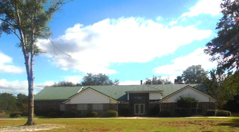 Not only do homes like these rarely become available, they rarely even exist! 4 bedrooms (2 expansive master suites), 3 baths, 3 car garage, over 4700 square feet on 2.5 acres AND it is WATERFRONT! Oh & it doesn't hurt that it is at a price per sq ft that will make all of your friends jealous! Recent updates include fresh paint, new carpet (living room & bedrooms) & new tile (front entrance & 2 baths). Not to mention:a gorgeous foyer, over-sized living room & wood burning fireplace. There is also an office with a fireplace which could easily be converted to 5th bedroom. The spacious kitchen includes all appliances and quality wood cabinets. There are too many features to list! If you let this one pass you by, you will end up regretting it!