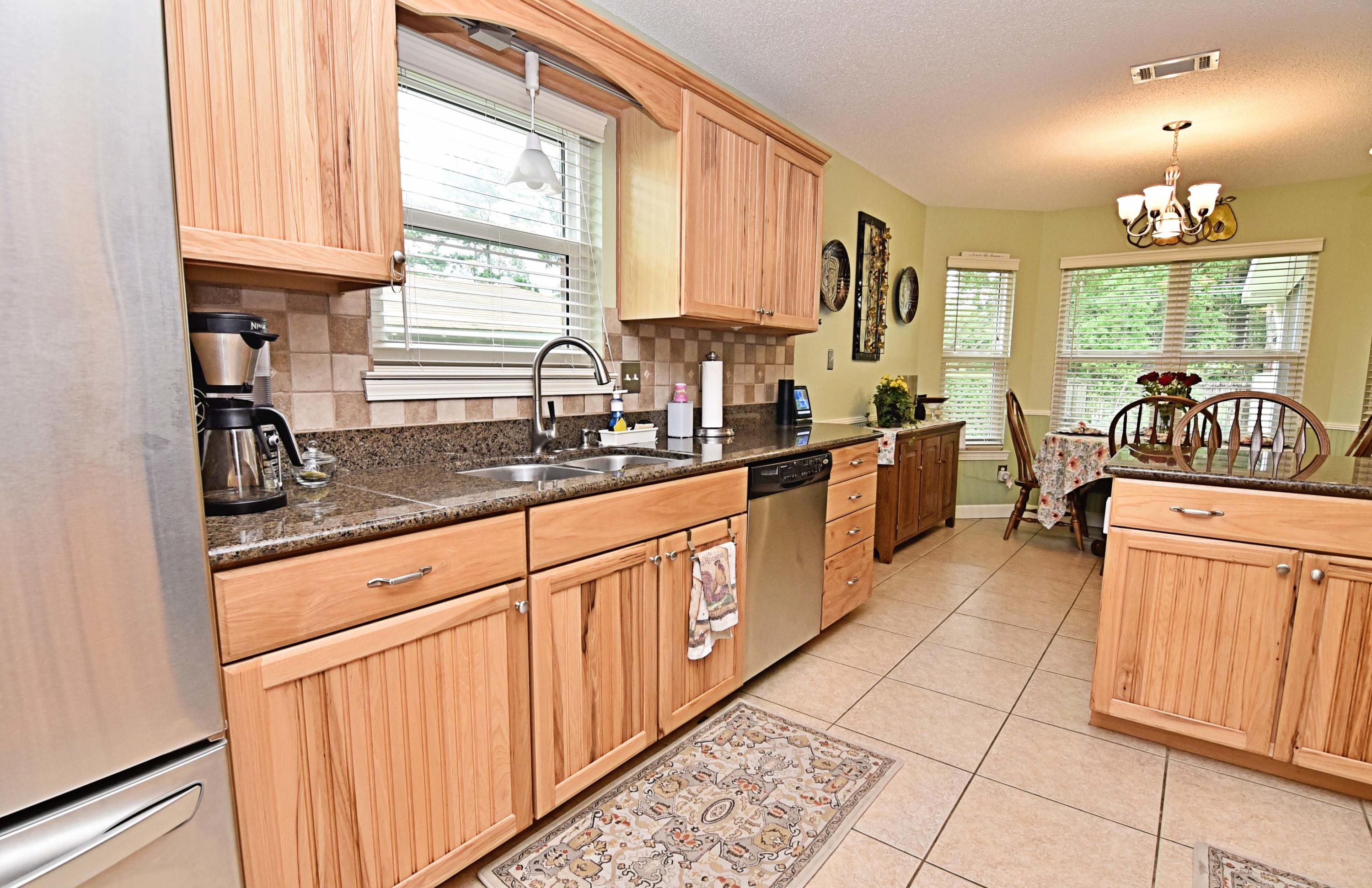 SE COR OF NE1/4 N180.23 FT TO ROW W65.06 FT S180.20 FT E65.16 FT TO POB - Residential