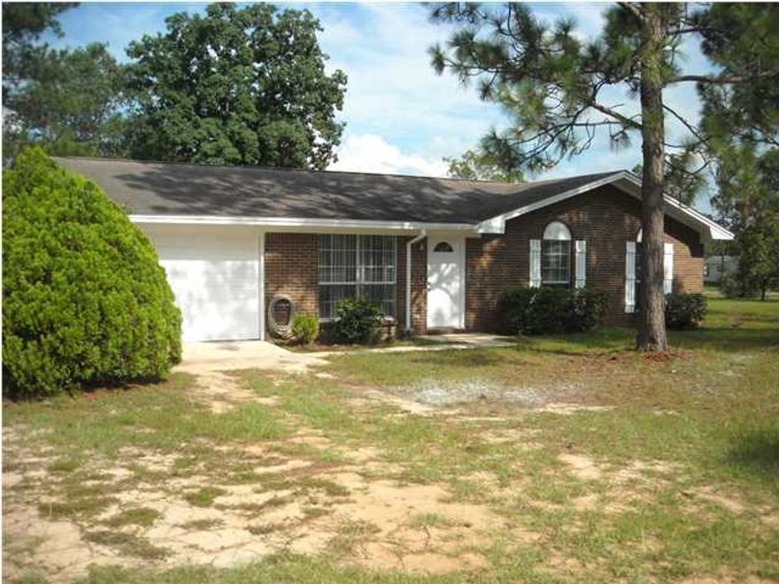 Call today to see this 3BR/1.5BA brick house on one acre w/ tile and carpet, open patio, fenced in area in back yard, one car garage and more. Pet considered with owner approval and non-refundable fee. Washer/Dryer will not be warranted. Owner will provide quarterly pest control.