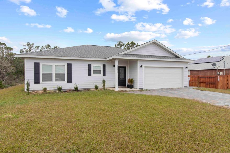 Welcome Home! Built in 2019 with no HOA on low traffic street, this 3 bedroom 2 bath home was crafted with beautiful modern finishes and upgrades. Inside you will notice Luxury Vinyl Plank Flooring throughout, a beautiful tiled shower in the master bathroom, separate dining room, eat in kitchen open to a large living room with a split bedroom floor plan. Outside be sure to notice the unique all paver driveway, and covered patio.