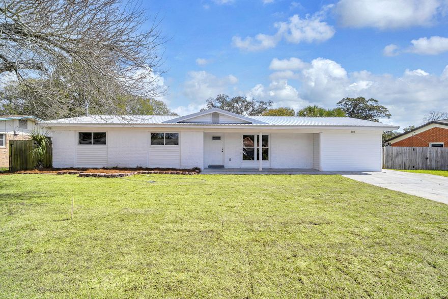 Completely renovated all-brick home in the heart of Fort Walton Beach! Just two blocks from Elliott Point Elementary and Docie Bass Park (tennis courts, ball fields, rec center, walking paths). Nearly 2,800 sq ft heated and cooled with permitted additions and a Florida room; Property Appraiser shows approx. 2,600 sq ft under roof. This home offers 3 private master suites, each with a full bath, plus a 4th full hallway bathroom. Major updates include brand new wiring, roof, HVAC, water heater, flooring, paint, and a fully redesigned kitchen with new cabinetry and countertops. Enjoy fantastic, plush landscaping, an LED-lit backyard putt-putt course, and sunroom. Golf cart-friendly neighborhood, walking distance to FWB Yacht Club, close to Ferry Park courts and just minutes to the beach.