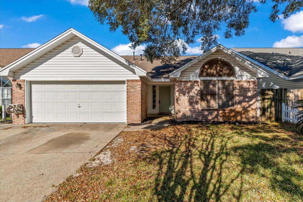 Charming home in the heart of Ft. Walton, super convenient to Hurlburt Field, Eglin AFB, Walmart, Sam's, Lowe's and much more. This nice home is 1338 sq. ft. with 3 bedrooms, 2 bathrooms. The master bathroom was just recently renovated and looks fantastic. A good sized walk-in closet in the master bath is awesome for this size home. There is large tile flooring throughout much of the home. The vaulted ceiling in the living room and master bedroom adds roominess and the wood burning fireplace adds charm. The kitchen and dining area is adjacent to the living room and includes new stainless stove, stainless dishwasher and disposer. A 2 car garage, and a small easy to maintain yard makes this a great home for a busy schedule. This yard can be mowed with a weed eater in 10 minutes, trust me, I did it. The roof was installed in April of 2014, and the gas water heater was just installed March 2025 right before listing it. Make arrangements to see this home today. Professional photos coming March 22nd.