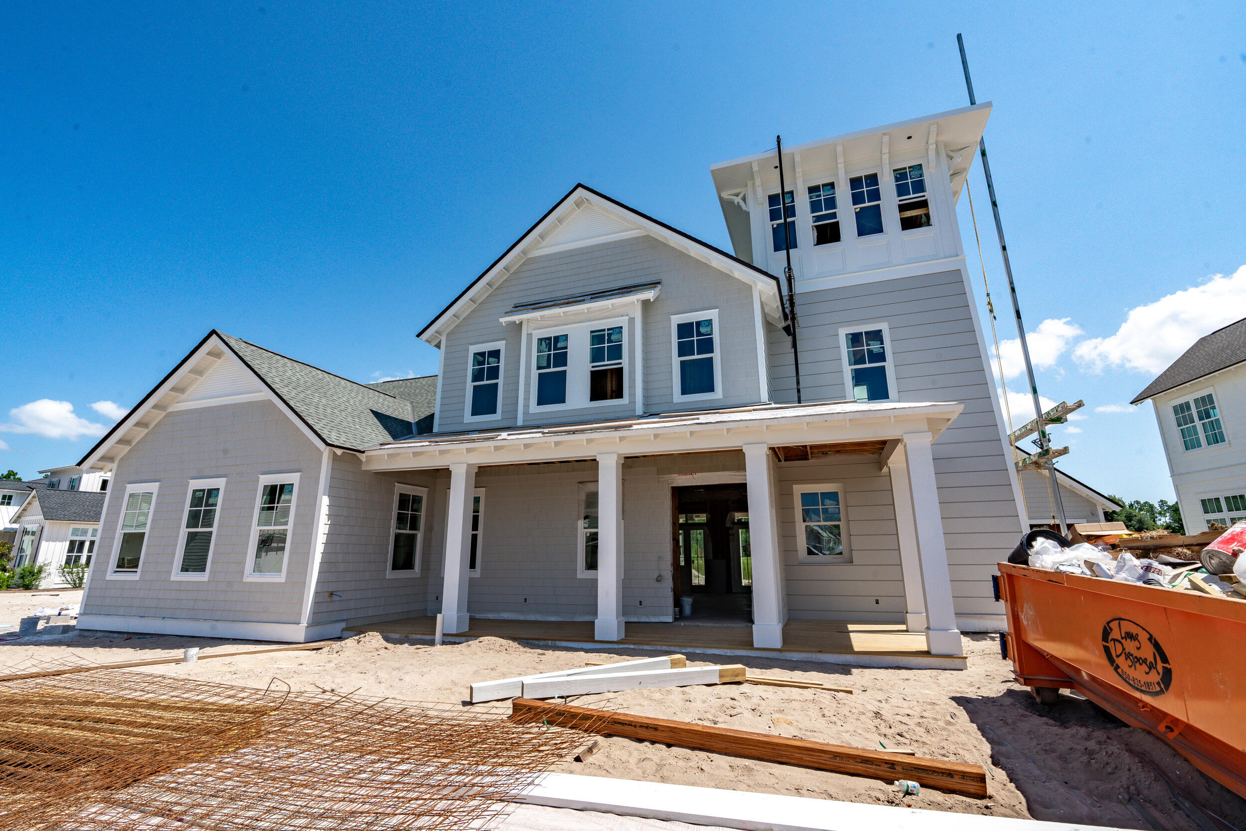 This stunning new home built by Dune Construction features the Watchtower floor plan, a stately residence with coastal-style architecture and premium finishes culminating in a third floor viewing tower that overlooks the Greenway neighborhood and Origins Golf Course. A spacious 3-story, 4 bedroom, 4.5 bathroom layout, this home hosts a fabulous, open-concept great room, kitchen, and dining room, plus a third floor den! Interior features include wire-brushed hardwood floors, wood ceiling beams in the great room and primary bedroom, 11' ceilings on the first floor, 10' ceilings on the second floor and 11' ceilings in the tower, solid core interior doors throughout, Venetian plaster gas fireplace in the great room, a large, fully-equipped kitchen with Thermador appliances and quartz countertops, marble bathroom and laundry countertops, and more. From the front entry, a dedicated foyer leads to the wide open great room and luxurious kitchen, with an adjacent dining room surrounded by natural light. Around the corner from the kitchen is a large scullery with additional sink, microwave, and plenty of cabinetry. The first floor primary suite is a serene retreat complete with two closets, dual vanities, and a tiled walk-in shower centered with a freestanding soaker tub. An expansive outdoor living space includes nearly 1,000 square feet of covered porches plus a private pool and cabana package with fireplace. 

The second floor holds 3 additional bedrooms, each with their own bathrooms. Finally, at the top of the stairs, in the home's namesake tower is a cozy den surrounded by windows with breathtaking, panoramic views across the community and golf course.

The Watersound Origins community is a highly sought after neighborhood full of amenities including the Village Commons pool & fitness center, sports courts, miles of nature trails, dock access to Lake Powell, unlimited golf and much more. **Pricing for inventory homes include lot premiums and may include optional upgrades. Added options/upgrades and pricing are subject to change. Please check with your Watersound Origins community specialist for the latest upgrades and pricing for this home. Photos depict a different floor plan from Dune Construction but with similar finishes. 