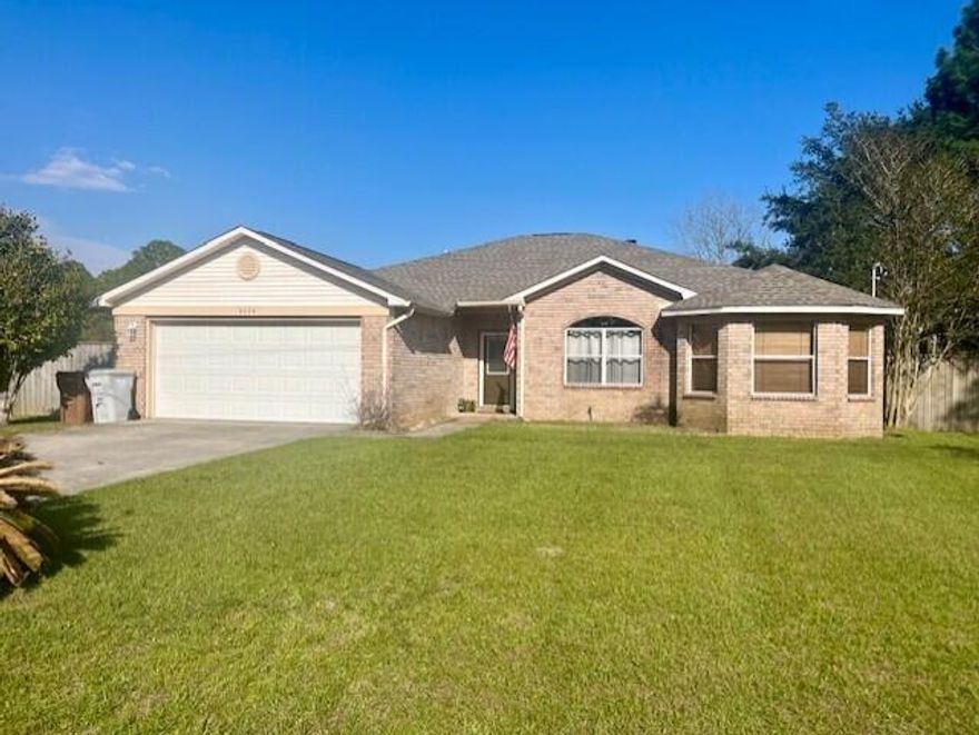 Great contemporary all brick home, 3 bed, 2 bath, open and split floor plan with enclosed sunroom. In Santander subdivision just west of the Santa Rosa & Okaloosa County-line. Interior features: Very open living/kitchen/dining area w/fireplace, great natural lighting, large kitchen w/breakfast bar, appliance package, tiled kitchen, and large pantry. Master is split with two walk-in closets, tub & shower combo, double vanity, ceiling fan and carpet. Exterior features: the sunroom, fenced yard, lawn pump, sprinkler system, mature shade trees, gutters & 30 year dimensional shingles. Location is key: Beaches, boating & fishing. To view, contact Navarre Beach Realty at 850-936-0700. The home is currently occupied, but will be available the first part of June.