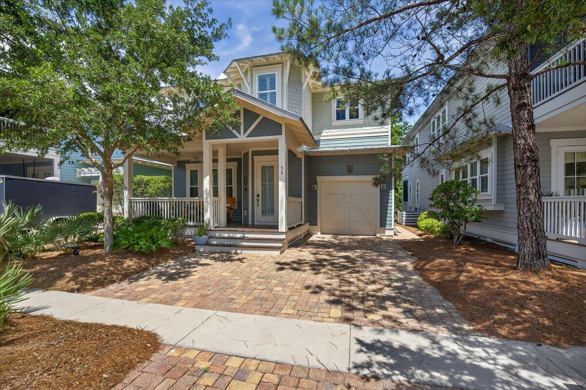 Embrace the 30A lifestyle in this beautifully furnished 3BR/3BA beach cottage in coveted NatureWalk at Seagrove! This home blends relaxed elegance with modern comfort--featuring hardwood floors, granite countertops, stainless steel appliances, and a spacious primary suite with a private balcony retreat.Unwind on the multiple covered porches, cozy up by the fireplace, or take off for the day on the nearby Lily Lane beach trail. Residents enjoy access to resort-style pools, a fitness center, walking and biking trails, and easy golf cart access to Seaside, WaterColor, and the sugar-white sands of 30A. Whether you're between builds or just seeking a fully turn-key coastal escape, this is your chance to live the dream at the beach!
