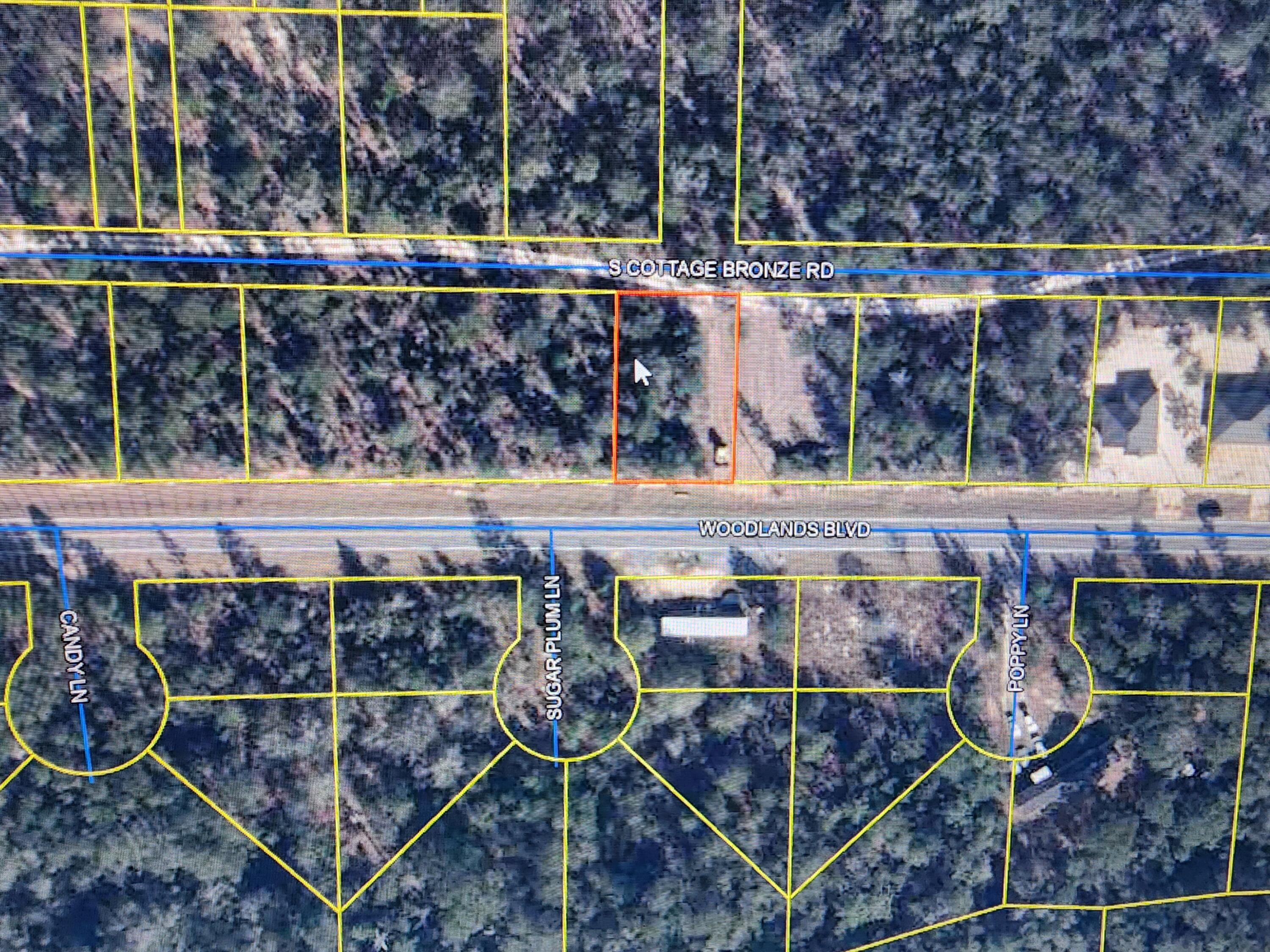 Beautiful vacant land ready to make a great home site, trees are still on the land to give that great shade in this Florida heat! Bring your plans and view this awesome piece before it's gone!! Paved road with easy access to Highway 90.