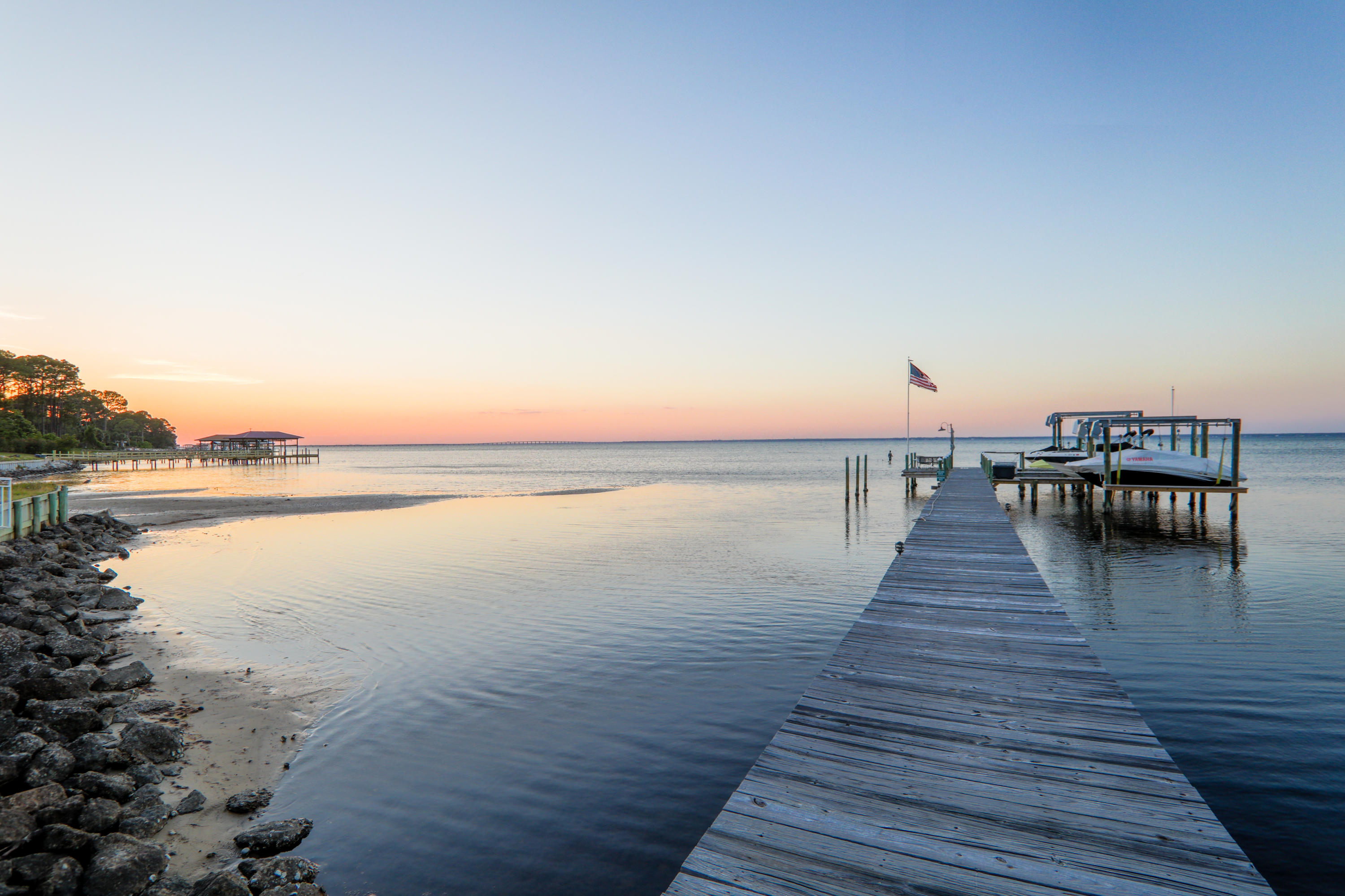 PRICE REDUCED TODAY ! *BAY FRONT LOT WITH SHARED DOCK WITH YOUR OWN BOAT SLIP.DOCK RIGHT NEXT DOOR.*Best Priced Bay Front Lot in the Miramar Beach area!*** Build your Dream Home on the Bay in Miramar Beach! This lot has a beautiful view is located on Garden Court in a quiet neighborhood located on a cul-de-sac. Lot includes a seawall... Drive is minutes from Silver Sands Outlet Mall, Destin Commons, Baytowne Wharf,and the Beach. Looking for Bayfront this property has it all ! Call Today