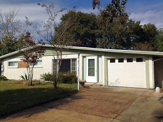 Now $125,000! Seller motivated, reduced over $14,000! Large 3BR/2BA home - much larger than it appears from the street! Nearly 1700 h&c sq ft PLUS a large sunroom and a 1-car garage. There is a large vaulted family room addition with exposed beam ceilings. Yard features an abundance of nature and wildlife (turtles!!), and you are a stones-throw to Vesta Park with a walking trail, slides and swings for the kids, and more! All of your ''major'' items have been updated - alum wiring replaced w copper, and fuse box replaced with circuit breaker panel, roof 10 yr +/-, Carrier HVAC 4 yr, sprinkler system. All appliances convey as-is including a washer & dryer. * Parquet under carpet in main house and terrazzo under carpet in family room. Gas stove, heat, hotwater heater, and fireplace