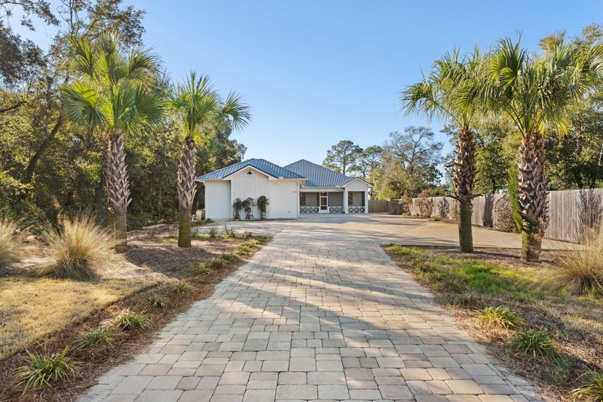 Come take a look at this gorgeous piece of paradise on a beautiful half-acre lot with a bay view to die for! Adjacent to one of the most beautiful bayfront parks in the area! This 4 bedroom and 2.5 bath home has open concept living area with 15-foot ceilings in the main living space, complete with a gas fireplace, custom cabinets in the kitchen along with a large butler's pantry, and stainless-steel appliances. There is an enormous laundry with plenty of storage right off the entrance of the 3-bay garage. The ensuite master bathroom has stackable washer and dryer hook-ups. This property also features a whole-home generator. The backyard features an enclosed pool with a covered patio to relax and enjoy the views of Choctawhatchee Bay. This home exudes warmth inside and out! A MUST SEE!