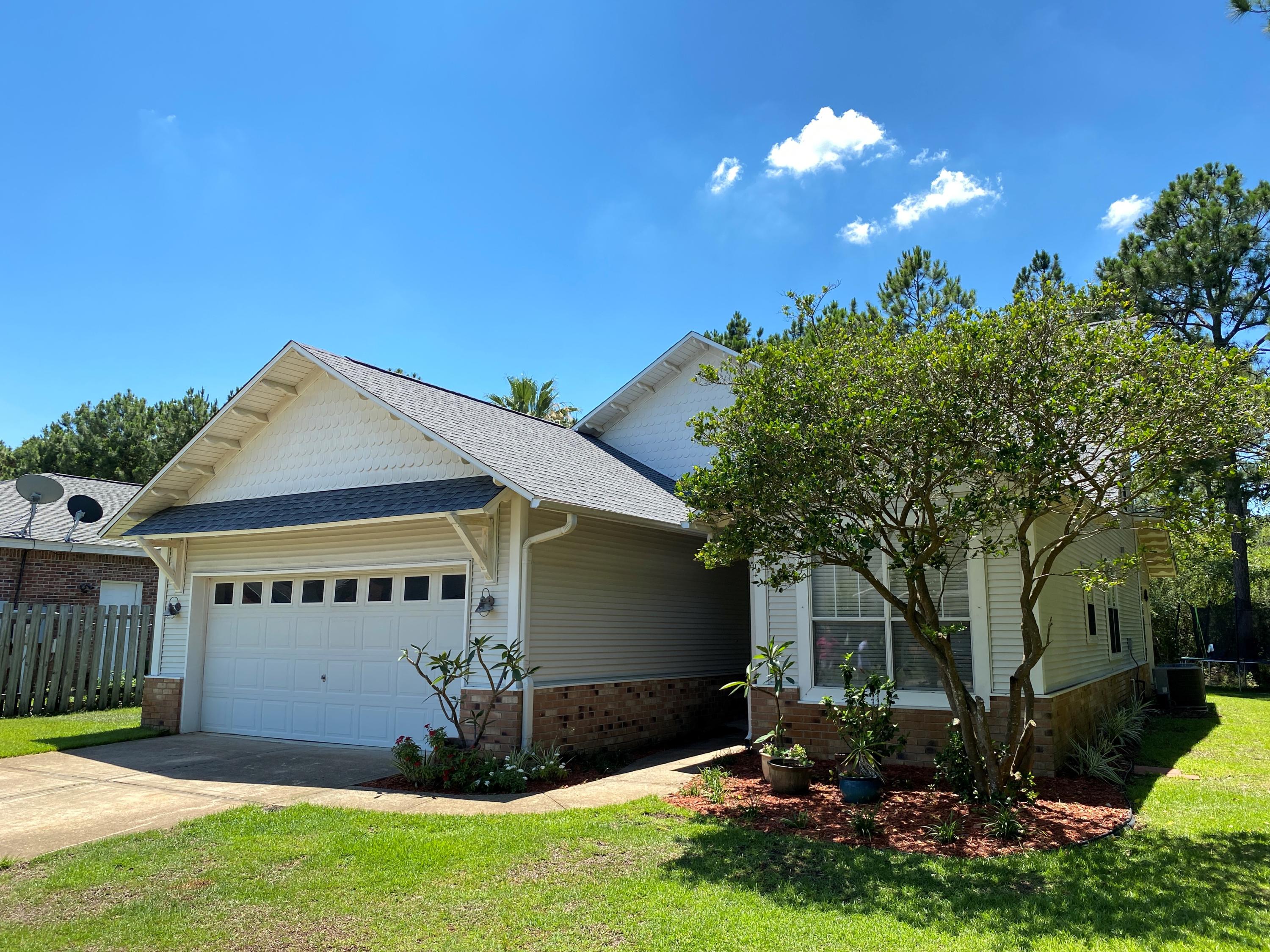 Priced to sell! Located on a large, private corner lot in the popular neighborhood of Escada. This one owner residence has been well maintained and is perfect for the whole family! The first lfoor master features double vanities and two closets. Other features include a 2 car garage, wood burning fireplace, no carpeting, second floor loft and much more! Escada amenities include a swimming pool, clubhouse, tennis courts, basketball court and the greenway walking trail to Butler Elementary School and 30A. New refrigerator in 2019 and new roof in 2020 and both interior and exterior A/C units are 5 years old.