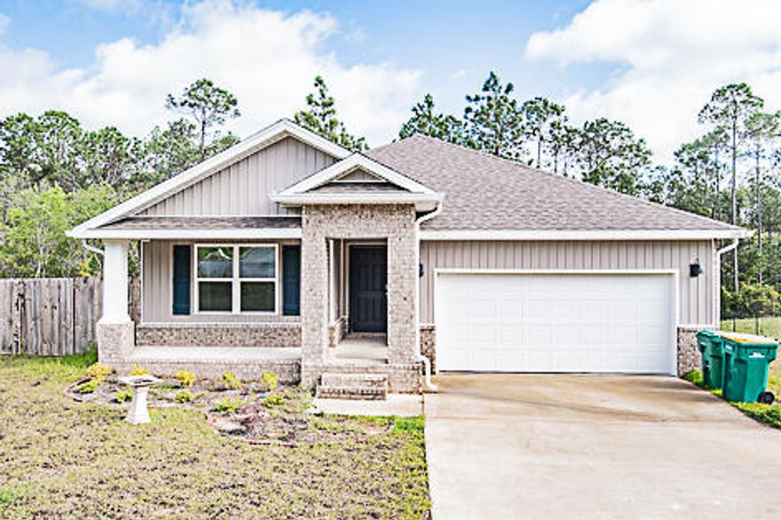 Available and move in ready!!!! Get away from it all in this 4 bedroom/2 bath home ''The Cali Plan'' by DR Horton.  Located in North Crestview with great privacy.  This home lives large and is in a country setting.  Offering an open concept kitchen with a dining area featuring a kitchen island bar, corner panty and nice eating area. The kitchen opens to the great room with access to the covered patio. Spacious bedrooms and walk in closets.  Beautiful wood look flooring throughout and nice carpet in the bedrooms. Washer and dryer included.  Backyard features privacy, creek, firepit and partially fenced yard.  2 car garage and covered back patio.  Double gate for parking boats or small campers in the back yard.  No inside smoking or vaping.  Pets will be allowed with a pet fee and approval