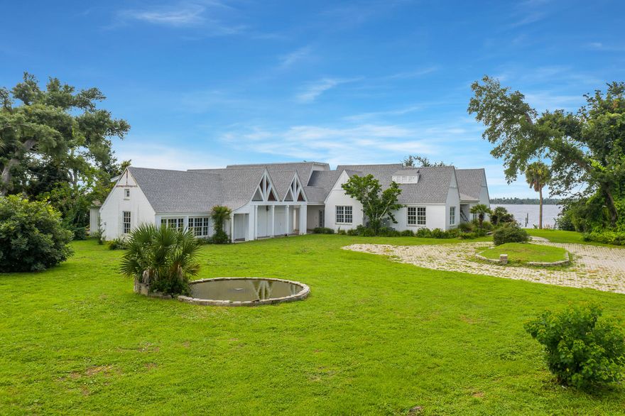 Reigning as one of the most sought-after locations in the panhandle, this iconic Bunkers Cove waterfront estate affords breathtaking views of St. Andrews Bay and is embodied with rich history of the Sudduth family and the vision of developer, H.L. Sudduth, that is still being carried out to this day. Built by the Sudduth Family as their primary residence in 1932, this prominent and historic home sits on 1.36 ACRES and 3 homesites. The value of this land is incredible! Leader of the family, H.L. Sudduth, is credited for the development of the Cove neighborhood from inception over 100 years ago and chose this specific homesite for his own private residence as it epitomizes the luxury, waterfront lifestyle while still offering the privacy desired.