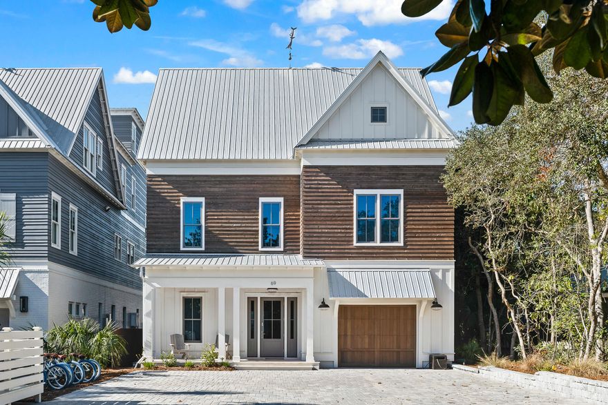 SELLER FINANCING OPTIONS AVAILABLE. Discover 69 Thyme Street, a luxurious beach house located just steps from Seaside and 30A beaches, with 250 feet of county-owned shoreline ensuring an uninterrupted beach experience. This meticulously designed home transcends the typical rental property, offering an extraordinary coastal getaway with unparalleled amenities and thoughtful design across three levels.The ground floor features a grand game room with two pinball machines, shuffleboard table, three big-screen TVs, and a full wet bar. A summer kitchen with double grills overlooks a cascading pool fountain, while two spacious bedrooms with ensuite bathrooms and a laundry room complete the level.Ascending the staircase, you'll find an expansive living and kitchen area accommodating 28 guests. The chef's kitchen boasts top-tier Wolf, Subzero, and Cove appliances. This floor also includes a double queen bunk room, two bathrooms, and a private bedroom.

The third floor houses another double queen bunk room, a grand master suite with a private balcony offering gulf views, a den/gaming room, and two additional bedrooms--one featuring a charming crib nook. The master suite includes a luxurious bathroom with a soaking tub.

The rooftop deck provides additional seating and dining with breathtaking ocean views. An elevator services each floor, ensuring convenient access for all guests.

Every detail has been carefully curated, promising an unforgettable coastal retreat that seamlessly blends luxury, comfort, and accessibility.