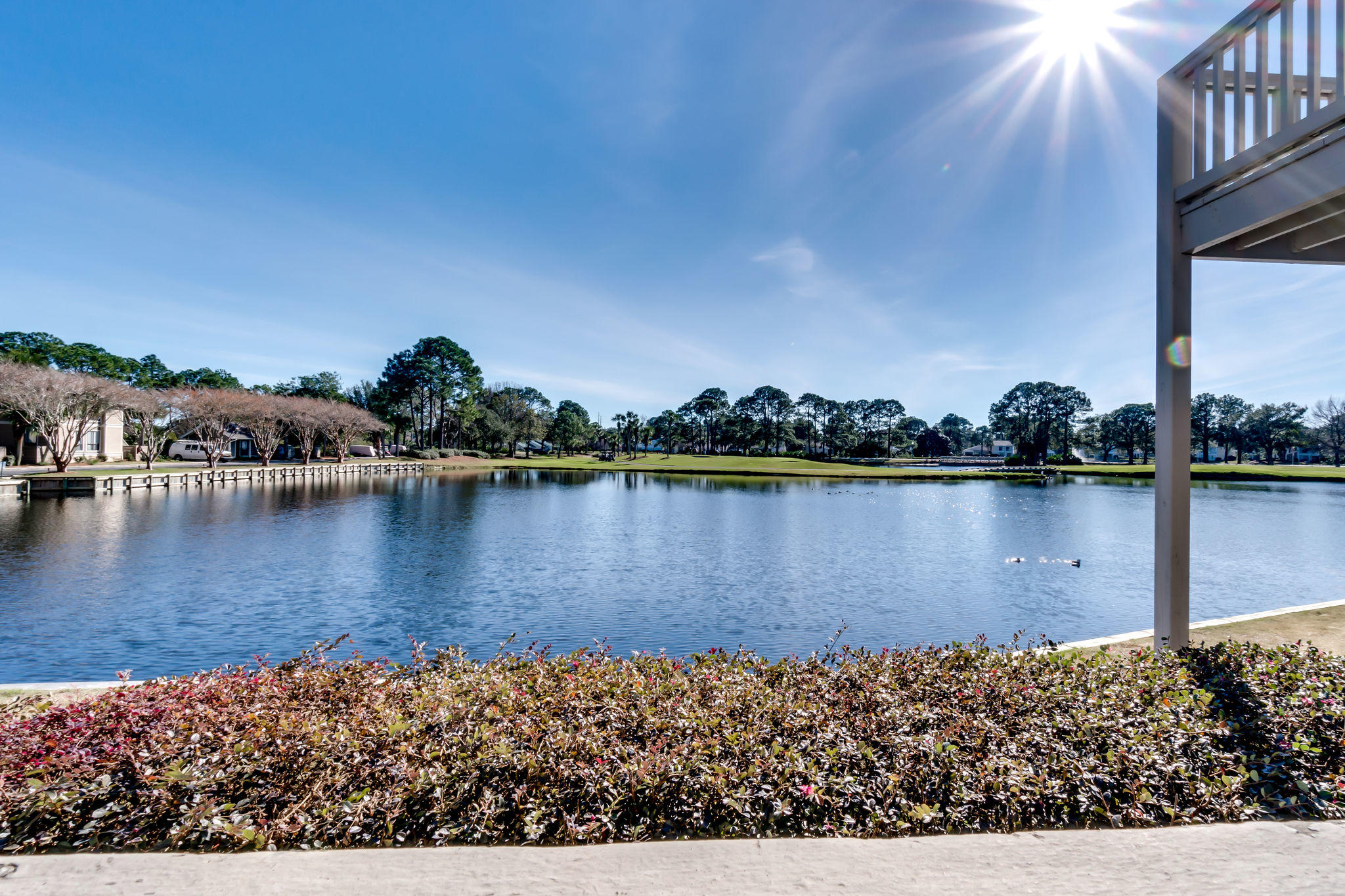 Coastal Luxury at its best in this spectacularily remodeled main floor condo with dramatic views overlooking the Links golf course, nearby lake and prolific wildlife. Ideally situated near the main gate and equally convenient to the Gulf of Mexico, Village of Baytowne Wharf or the nearby Grand Blvd. Offered turnkey ready and completely furnished to provide you with a vacation home or rental property. Sunshine galore in this south facing location.