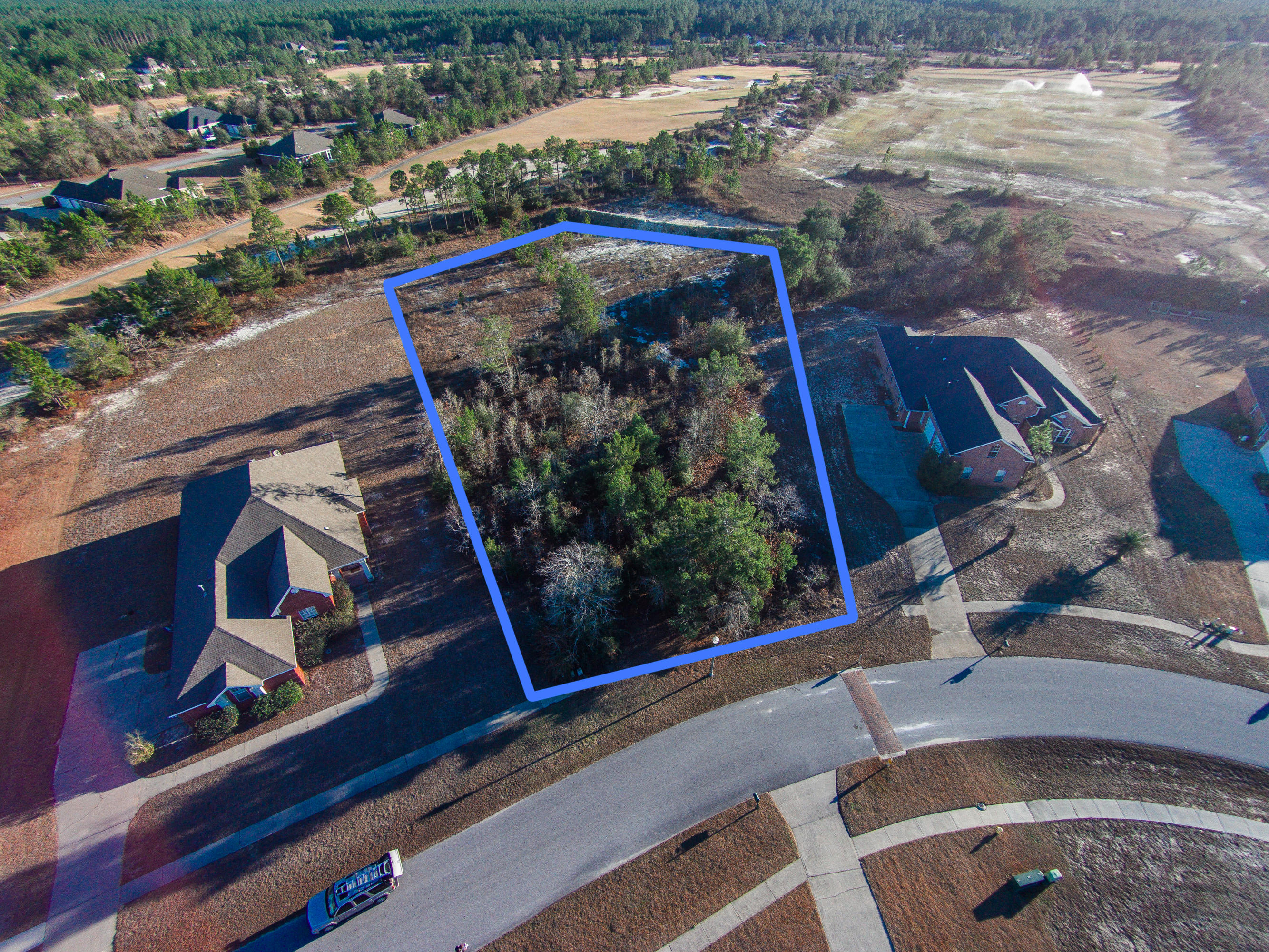 ~~MAJOR PRICE REDUCTION~~ Bring all reasonable offers, seller is motivated! This is an oversized lot on the golf course, with beautiful views that are a must see. Windswept Estates is a residential golf community located in Freeport, Florida on 750 acres just north of the Beaches of South Walton. The exquisitely landscaped gated community features 401 estate sized lots surrounded by nature and peaceful serenity offering affordable living within reach of white sandy beaches and emerald waters of the Gulf of Mexico.