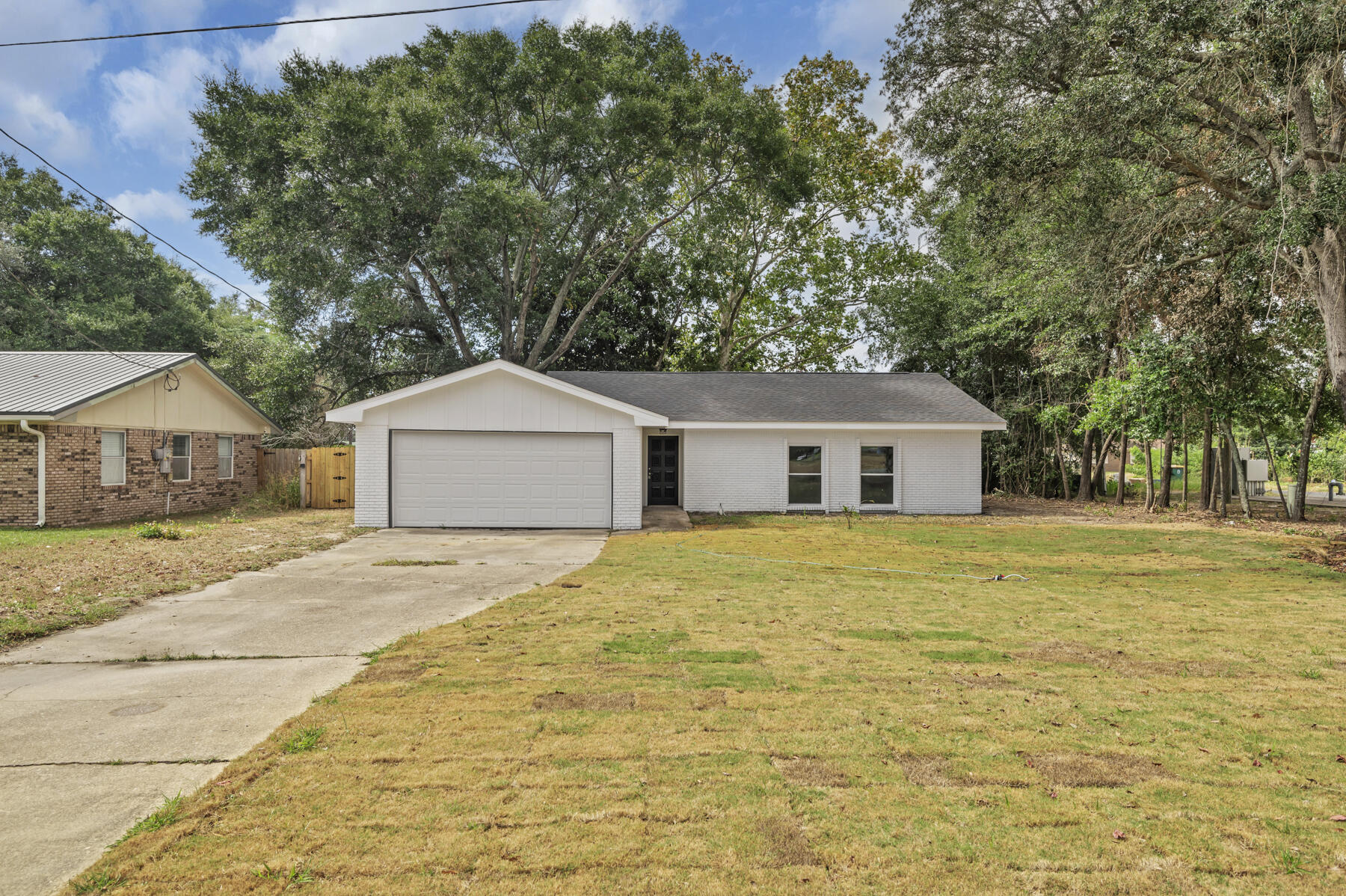 Newly Renovated Home in the heart of Port Dixie in Shalimar. Brand new flooring throughout. Tons of natural lighting and an open floor plan. Covered back porch perfect for morning coffee. Large fenced in backyard. New Roof! Call your favorite Realtor today to schedule a viewing! As Always, Buyer To Verify All Information Deemed Important Including: Square Footage, Room Dimensions, HOA Fees & Dues and/or Taxes. All Dimensions Are Approx.