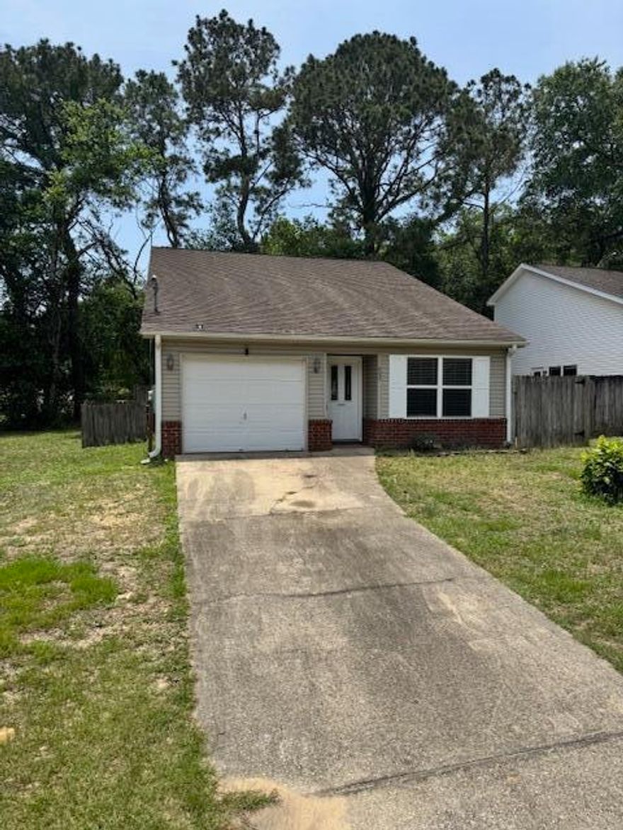 Investor Special - Central Crestview Opportunity! This 3-bedroom, 2.5-bathroom two-story home is a diamond in the rough just waiting for the right investor or flipper to unlock its potential. Conveniently located in the heart of Crestview, this property offers solid bones, a spacious layout, and a prime location - the perfect recipe for a profitable renovation.Inside, you'll find a large living room, a generous dining area, and an open kitchen layout with plenty of possibilities for modern upgrades. The primary bedroom is conveniently located on the first floor, offering flexibility in design. Upstairs are two additional bedrooms and a full bath, ideal for a family-friendly layout or future rental potential.This home needs vision, creativity, and some TLC, but with the right updates, it could easily shine again as a great flip or long-term investment property
Priced to reflect current condition - sold AS-IS.HVAC is believed to be 2015/2016. Roof and water heater are original.  Don't miss your chance to bring this hidden gem back to life!

