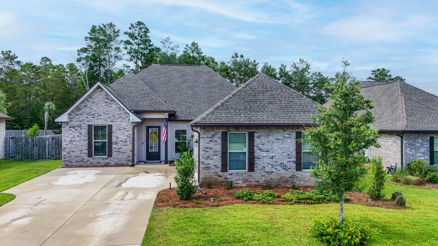 Welcome to 251 Blaze Blvd in The Trails of prestigious Hammock Bay. The DSLD ''Harmand'' has an open floor plan 4/3, Plus an extra flex room/office w 2457 s' of living space. Ceramic Tile throughout- NO CARPET! Gas fireplace in large Great Room W/crown molding and 12' ceiling. DR also has crown molding and Large windows which let in abundance of Florida sunshine! Large Kitchen Island w quartz counters and 3 pendant lights, gas range, brand new dishwasher and walk-in pantry w custom shelves complete the Kitchen. Porch entry through Kitchen leads to an open extended patio- great for entertaining outside. Large, wooded lot w 6' Privacy fence. wooded Lot & backs up to woods. Quiet and serene back yard oasis. Large Master Bedroom offers coffered ceiling, crown molding and leads to Master Bath w large soaker tub, stand-alone shower and double vanities w quartz counters. Large Walk-in closet w custom shelves. This home has an additional 3 guest bedrooms and a flex room/office. 2 guest baths, one w double sink vanity. Extra large Laundry w quartz counters, Cabinets and large storage closet.Handy Boot bench at garage entry. 2 car garage w attic storage/retractable staircase  J-Driveway makes for elegant curb appeal. Irrigation system/professionally landscaped yard/rust prevention tank and Tankless Water Heater come w this beautiful home. Custom Blinds throughout home, window treatments do NOT convey
HAMMOCK BAY offers SO MANY amenities: Clubhouse w Theatre, 3 Pools, Fitness Ctr w Fitness Classes, Tennis ,Basketball and Pickleball Courts. A General Store, Props Brewery and Brand New Dental Bldg all within walking distance! 
Activities in HB include: Live Music, Farmers Mkt, Karaoke, Paint Parties, Trivia Night, Parades, Pumpkin Patch in Fall, Santa Visit in Dec, Egg drop w Easter Bunny in Spring. A TRULY SPECIAL place to LIVE!
****SELLER WILL GIVE $10,000 TO BUYER TOWARD 
CLOSING COSTS****