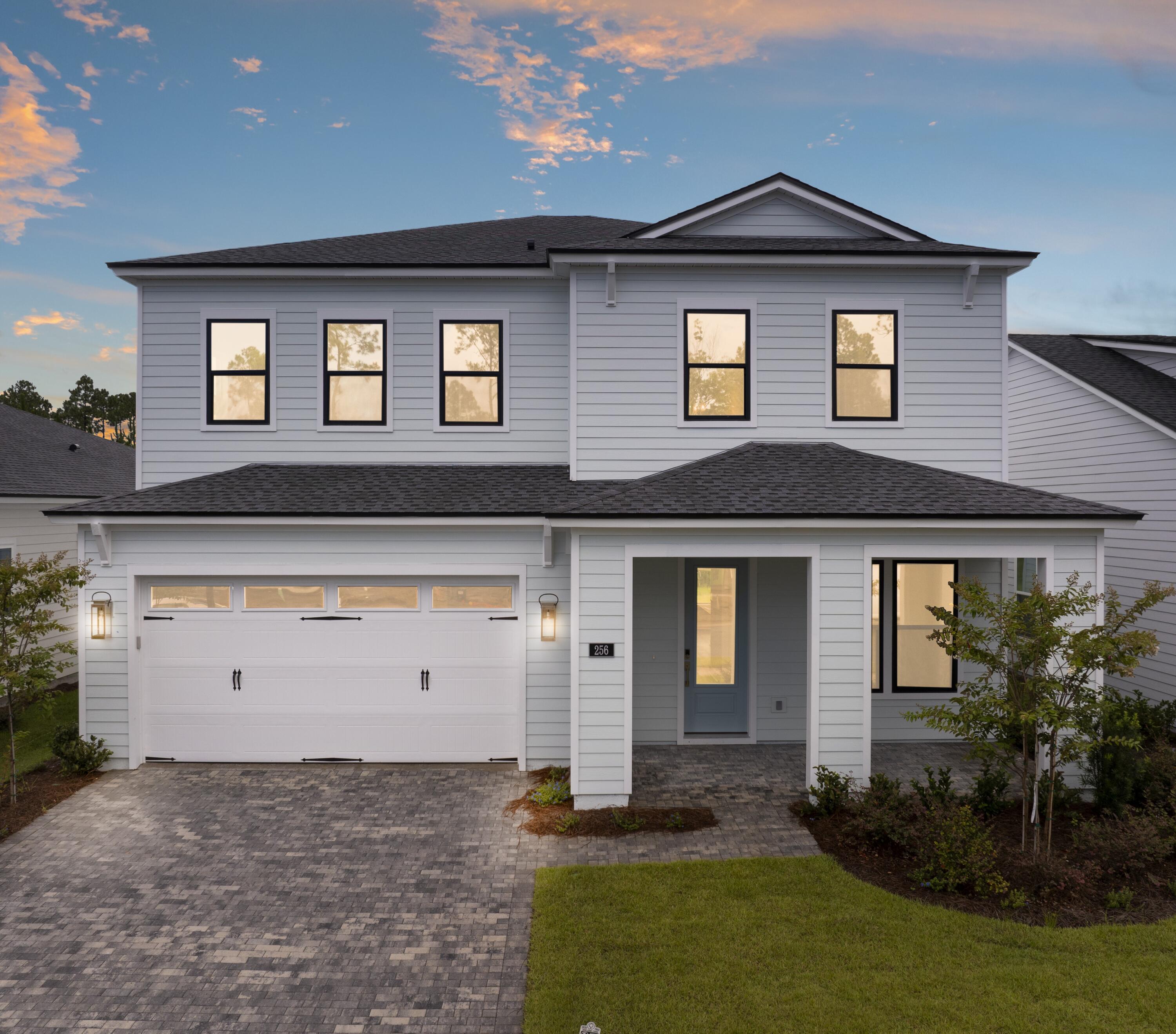 New construction home in a prime location. Exceptional 4-bedroom, 3-bathroom, Flex room/office, upstairs loft/bonus area, two-story masterpiece that combines luxury, comfort, and modern design. This home boasts an array of high-end finishes and thoughtful details, perfect for families and entertainers alike. 10' ceilings on the first floor, creating an open and airy atmosphere throughout the main living areas. The luxurious vinyl plank flooring flows seamlessly throughout, while tile flooring in the bathrooms adds a touch of elegance. The gourmet kitchen is a chef's dream, featuring sleek quartz countertops, a stylish tile backsplash, and top-of-the-line appliances. The open layout allows for effortless flow between the kitchen, dining area, and the spacious living room, making it perfect for both everyday living and hosting gatherings.
A versatile office/study room on the first floor provides the ideal space for remote work or a quiet retreat. The secondary bedroom on the first floor offers convenience and privacy for guests or family members. Upstairs, you'll find a large loft/bonus area perfect for additional living space, a playroom, or a media room. The primary bedroom is a true sanctuary, with ample space, a luxurious tile shower, and generous closet space.
Outside, enjoy peaceful evenings on the covered lanai with beautiful pavers, overlooking a large serene, private wooded area, that provides privacy and tranquility. The paver driveway adds to the home's impressive curb appeal and completes the luxurious look of this new construction home.
Located in a gated community with resort style amenities including pool, clubhouse, fitness center, pickleball, tennis, playground, multi-purpose field and more.
Short drive to public beach access, Pier Park shopping, dining and entertainment, airport, future FSU/TMH medical campus and recreation outdoor activities at Frank Brown Park.
This home is truly a must-see! Schedule a tour and make this dream home yours today. Construction is complete available for quick move-in.