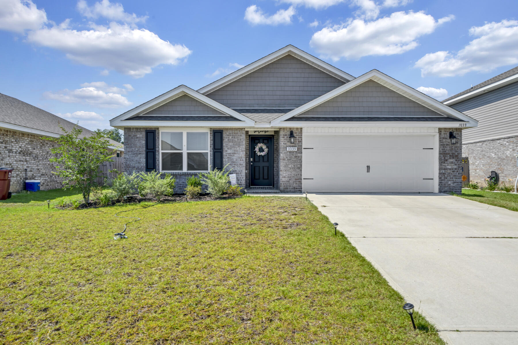 Great curb appeal, well maintained and so many upgrades make this home better than new! VA Assumable loan available with a 2.76% rate! Redstone Commons is a widely sought after community offering a resort style pool and clubhouse, dog park, and playground, conveniently located in the heart of Crestview and offering a quick commute to area bases. The Cali is a one story floor plan featuring 4 bedrooms, 2 baths, covered back porch & 2 car garage. The open kitchen features an island, breakfast bar, stainless appliances and granite countertop. The kitchen opens to the great room w/ access to the covered porch. The primary suite is just off the back side of the house & primary bath features a walk in closet, dual sinks and large 5' shower. Now let's talk about all the upgrades! New light fix ures throughout the home. Ceiling fans with lights throughout. Blinds included. Kitchen upgrades include all black cabinet hardware and new sink fixture. All the baths have been upgraded with black hardware and mirrors. Primary bath has new glass barn door with matt black accents and shower head with hand held sprayer. Primary walk in closet with closet system. Nursery bedroom with custom accent wall. Indoor laundry room with new cabinets. Nice size backyard includes the privacy fence, outdoor solar lights, and extra landscaping. Absolutely a move in ready home! Call today to see your new home!