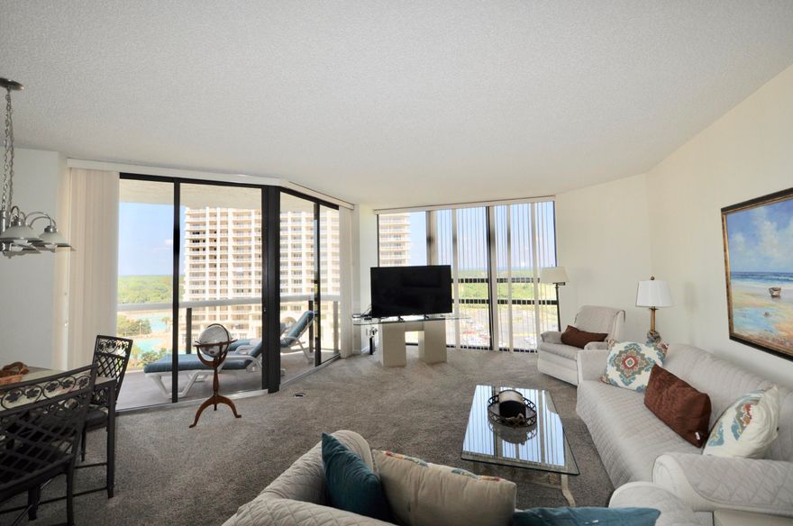 Lots of options with this TWO CONDO deal! The unit boasts great rental history, views of both the gulf and the bay - and is offered fully furnished! New carpet has been installed in all bedrooms. The unit offers many rental options and tons of privacy. Located at the end of the 7th floor corridor, you will not be disturbed by other guests in the halls. There is a bathroom for each bedroom, and you can easily block off 712A as an efficiency studio should your guests not require all 3 bedrooms. Surfside has a 24 hour front desk, covered parking, deeded beach access, a heated pool, an in house restaurant and is walking distance to many of Scenic 98's most notable destinations.