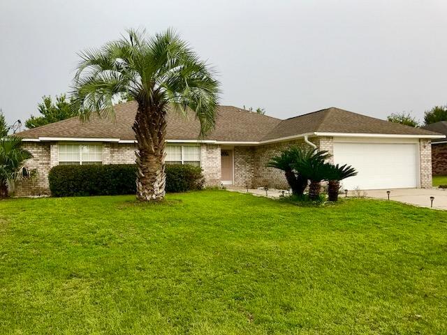 Assumable VA Loan @ 2.675% Located south of I-10 in Westview Estates, this all-brick single-story home offers a welcoming layout with three bedrooms, two full baths, and an additional office or flex room. The living room is bright and open, featuring cathedral ceilings and a fireplace that creates a warm focal point. The kitchen and dining area are designed for everyday functionality while still providing plenty of room for gatherings.The primary suite is spacious and thoughtfully arranged with double vanities, a garden tub, a separate shower, and a walk-in closet. Outside, the fenced backyard includes an open patio and storage building, making it easy to enjoy both leisure and practicality. With its convenient location near schools, shopping, and Eglin AFB, this home blends comfort and accessibility. Schedule your showing today!