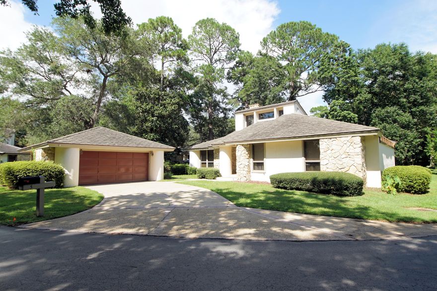 Located in the highly desired Balmoral Subdivision this spacious home has a unique floor plan. Sunken living room has vaulted ceilings, upper story windows, a gas stone fireplace, built in bookcase, teak laminate flooring plus wet bar.  The kitchen is remodeled and includes quartz counter tops, stainless appliances and breakfast nook. The dining room has teak laminate flooring, a tray ceiling, could accommodate a large table. Both bedrooms have their full baths. The Master suite is oversized. The master bath has a jet tub, shower and large walk in closet. The two car garage has extra space and entrance for a golf cart. Rear screen porch is also spacious. Selling partially furnished. Exterior gas line for outdoor cooking. Architectural DECRA Shake Metal Shingle roof installed in 201