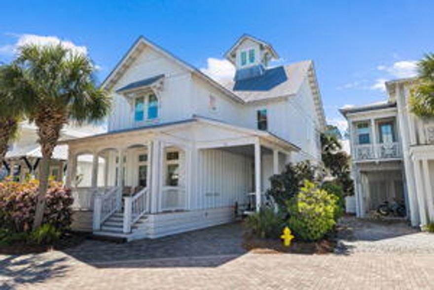 Seagrove Bliss-South of 30A!  Nestled on a private culdesac in the pristine Cottages of Eastern Lake neighborhood, this enchanting 4/4.5 plus 4 twin bed bunk room is your perfect beach paradise with upgrades galore.  Gas lanterns light the entrance to this home, adorned with hand scraped hardwoods throughout, marble & quartz countertops in each en-suite bathroom, shiplap, designer lighting, bamboo lined blinds and other modern conveniences to elevate your vacation lifestyle.  The open-concept floor plan seamlessly connects the living, dining, and gourmet kitchen areas, perfect for entertaining. The gas log fireplace adds charm to the main level.   Indulge in the gourmet chef's kitchen Indulge in the gourmet chef's kitchen, featuring farmhouse sink,  high-end appliances including Wolf 4 burner range with grill, built in ice-maker, pot filler, fabulous island and plenty of storage.  Embrace outdoor living on one of the three covered decks. The deck right off the kitchen offers privacy shutters and is perfect for your morning coffee. The tiled back porch has a permanent gas line for grill or seafood boil pot! A generously-sized guest bedroom with en-suite bath completes the main floor.  Additional storage room is hidden under stairs.   
Second floor boasts the luxurious private owner's wing which opens to a covered deck.  The owner's  bath features a soaking tub, large shower, two vanities and luxurious finishes.  Dual closets connected by an additional dressing vanity completes the owner's suite.   The second floor also offers two additional bedrooms with en-suite baths and a 4 twin bed bunk room for extra guests or little ones. The laundry room completes the second level with excessive cabinetry that can be used as owners' closets. 
A private outdoor shower allows for easy post-beach cleanup. Store all your beach gear and bicycles in the attached carport and spacious storage area.
Enjoy quick access to the Gulf, with a short walk from your doorstep to 2  public beach areas, Deer Lake park plus a nearby boat ramp 

Call or text  today to schedule a private viewing and make this dream house your reality.

