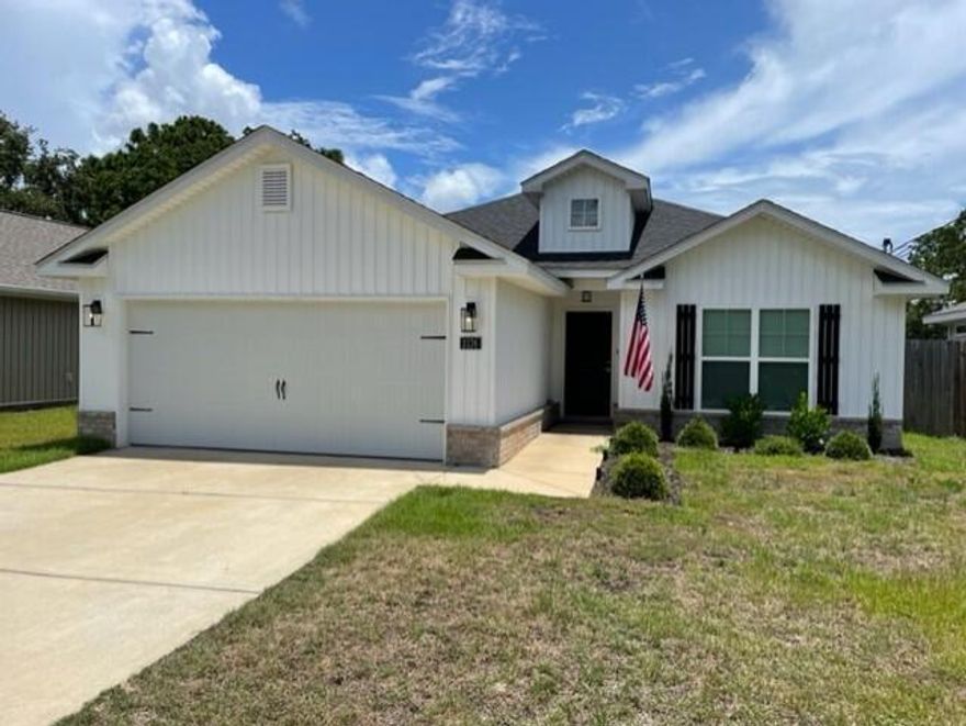 Beautiful Home with loads of upgrades.  Large open living area with vaulted ceiling in Living Room. The kitchen has 30 inch upper cabinets, granite counter tops, brand new stainless appliances, and gorgeous light fixtures. Dovetail drawers with Soft-close glides and a large pantry. The spacious Master Suite features Trey Ceiling. The Master Bathroom has a double vanity, granite counters, separate shower, garden tub and 2 walk-in closets. The back covered patio features an added wood deck which is great for relaxing or entertaining. This neighborhood is in a Great location.Home is available now. To view, come by Navarre Beach Realty at 8666 Navarre Parkway in the Winn Dixie shopping center to check out a key. Office hours are Mon-Fri 9am-5pm. Keys must be returned before 5pm.