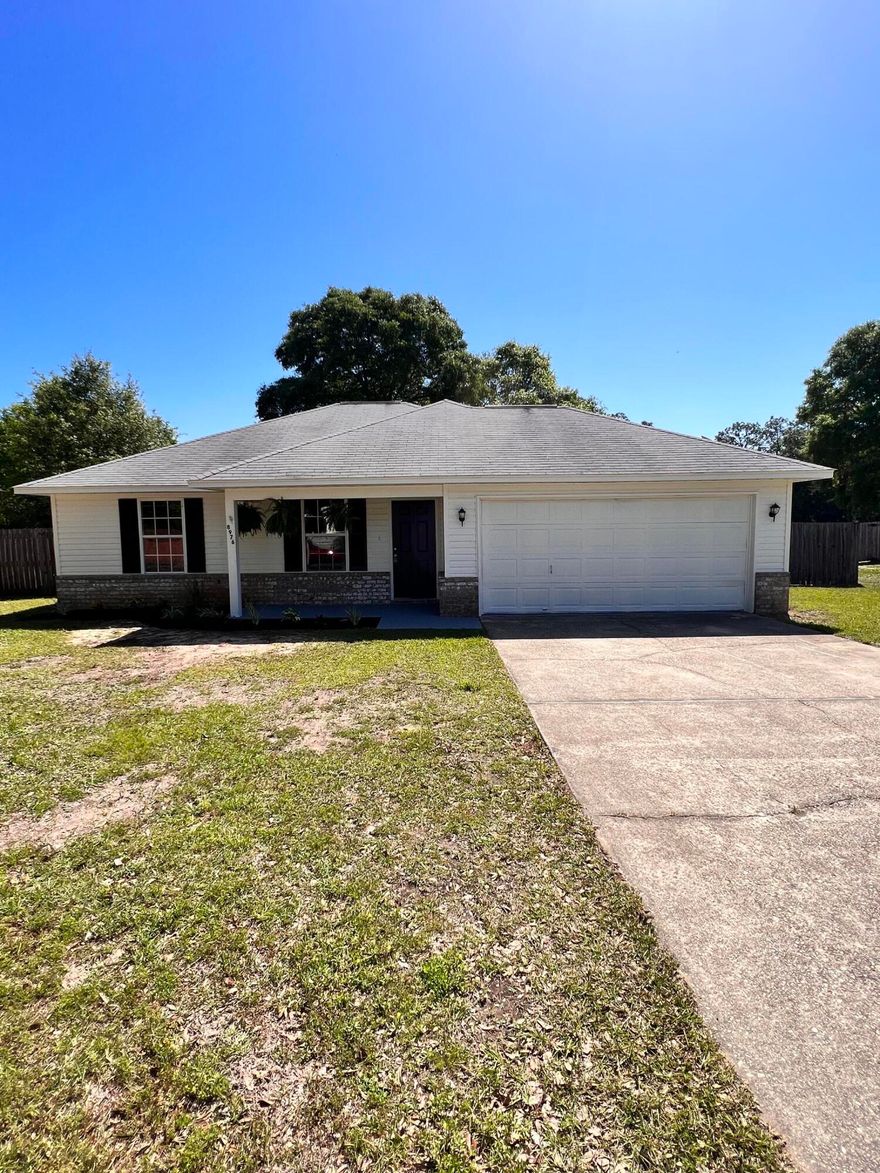 Welcome Home to your beautiful newly remodeled home in Milton! This is a must see, move in ready 3 Bedroom, 2 Bath split floorplan home that has all new cabinets, toilet's, microwave, dishwasher, stove, flooring, paint, lighting fixtures and countertops. Appliances are stainless steel. This home is conveniently located near the interstate, with easy access to Pensacola, Navarre and Crestview within 25 minutes. Don't miss out!