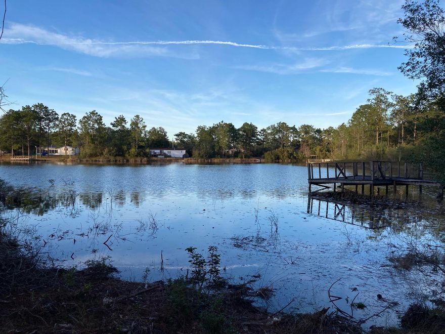 Waterfront property on Imperial Lake!  Take note: the Seller will offer financing to a qualified Buyer.  This more than one acre lot is close to DeFuniak Springs (voted the best small town in Florida) and a short drive to the World's Most Beautiful Beaches.  The access is by a County maintained, paved road and the property is fenced on two sides. The dream of waterfront living in a close-in location is rapidly getting out of reach for most people.  This is an opportunity you don't want to miss.  Buy and hold as an investment or build your dream home in the country.  The current owner will be clearing the land for a home site, so make contact soon to have input.  Mobile homes are not allowed.  Buyer to verify all information.
