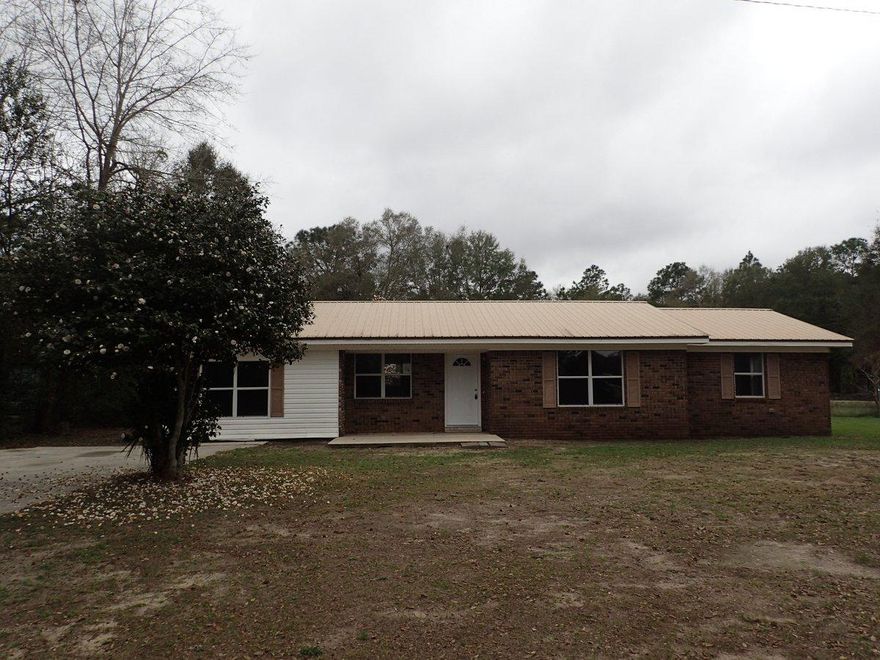Lots of WOW factor with this Fannie Mae Homepath REO property! Just a short mins drive from Crestview this home, though built in the 70's screams modern build! At over 1600 square feet, this mostly brick exterior property has a metal roof and newer HVAC. Tile throughout most of the home with new carpet in the bedrooms. Home has new cabinets, tops, fresh paint, new fixtures and is financing and move in ready. Lots of home for a small ticket price. Call today, or indeed this one will be gone!