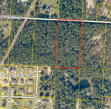 4.98 Acres, was not actively marketed. Listed for comp purposes only