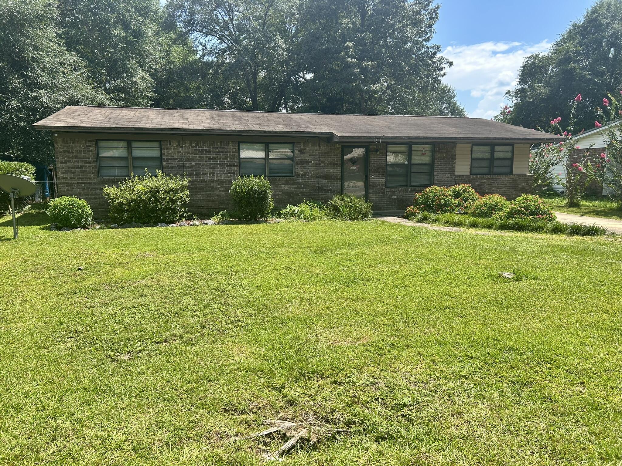 Nice Brick home with an in ground pool, fenced back yard and screened porch. The garage has been turned into another living area great for entertainment. Property is located in a prime location near shopping, restaurants and entertainment.Property sold ''As Is''